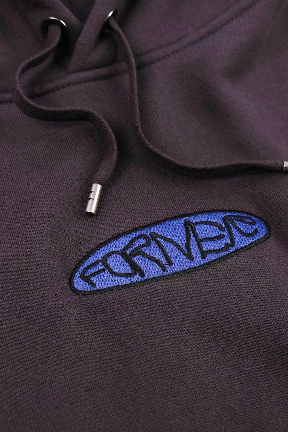 Black hoodie with a blue and black logo on the chest