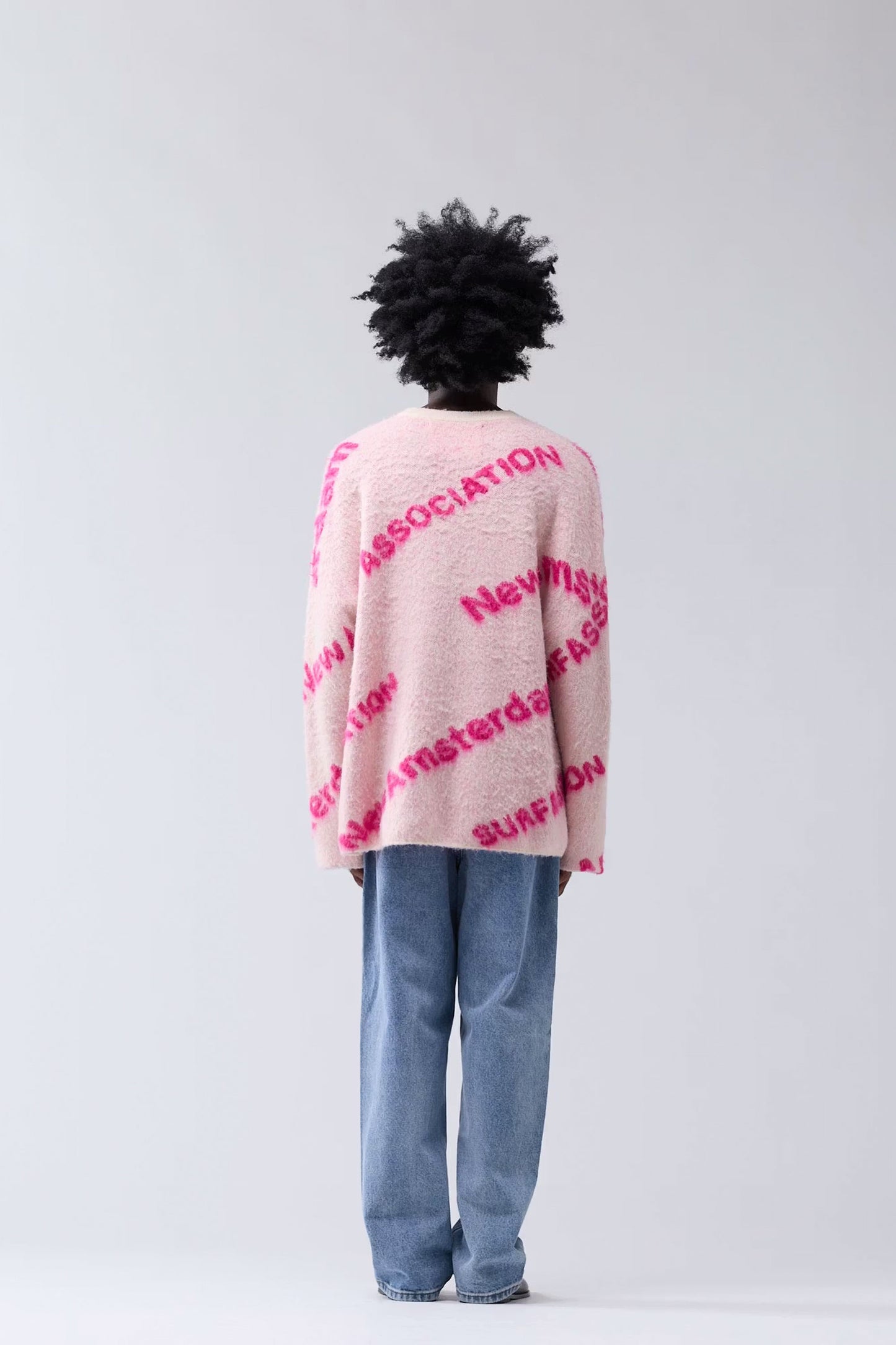 New Amsterdam Pink sweater with magenta text Pukas Surf Shop