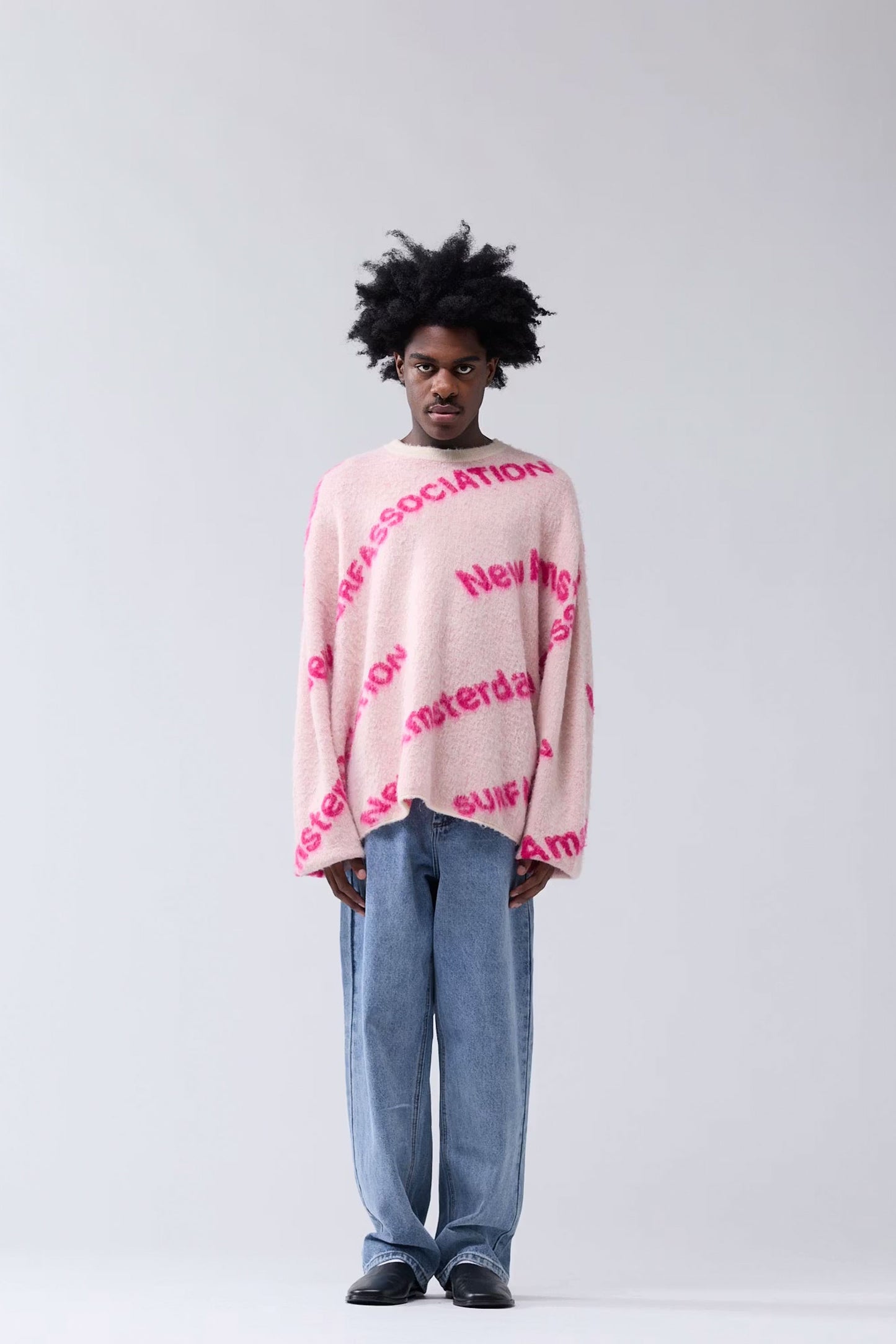 New Amsterdam Pink sweater with magenta text Pukas Surf Shop
