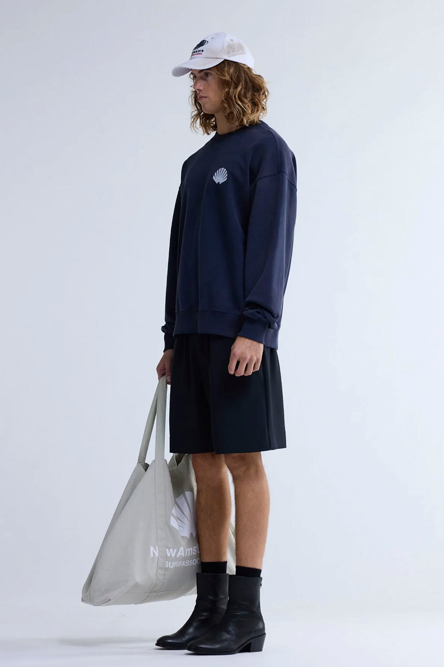 NEW AMSTERDAM SURF ASSOCIATION LOGO CREWNECK - Front view showing navy blue colorway and relaxed fit