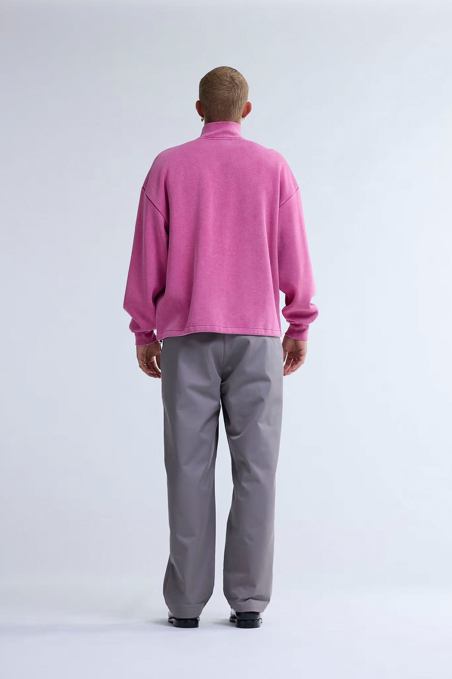 New Amsterdam Surf Association Plate Half-Zip Sweat in Washed Pink - back detail view showing drawcord hem and metal logo