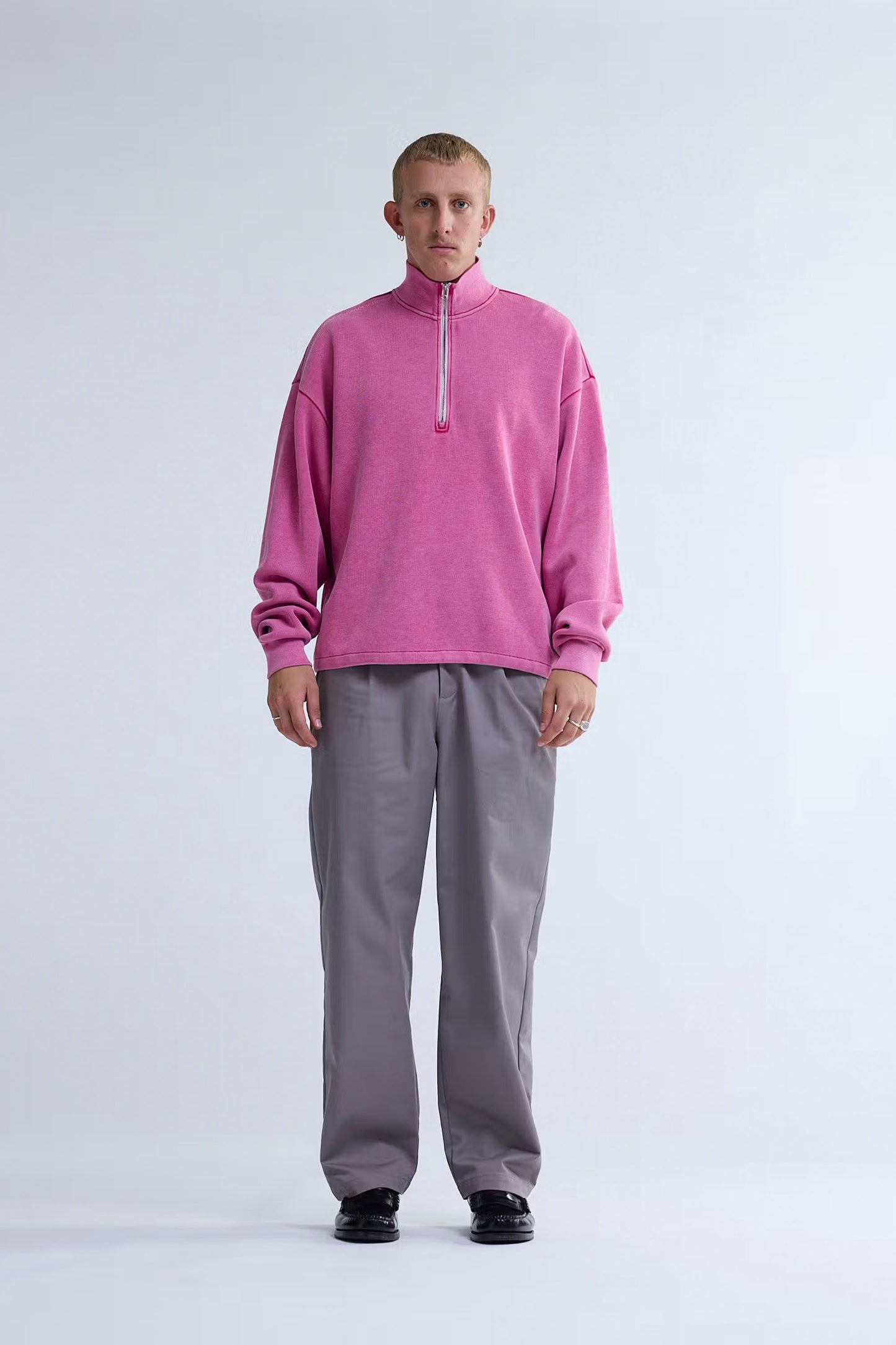 New Amsterdam Surf Association half-zip sweat front view - washed pink colorway with adjustable hem