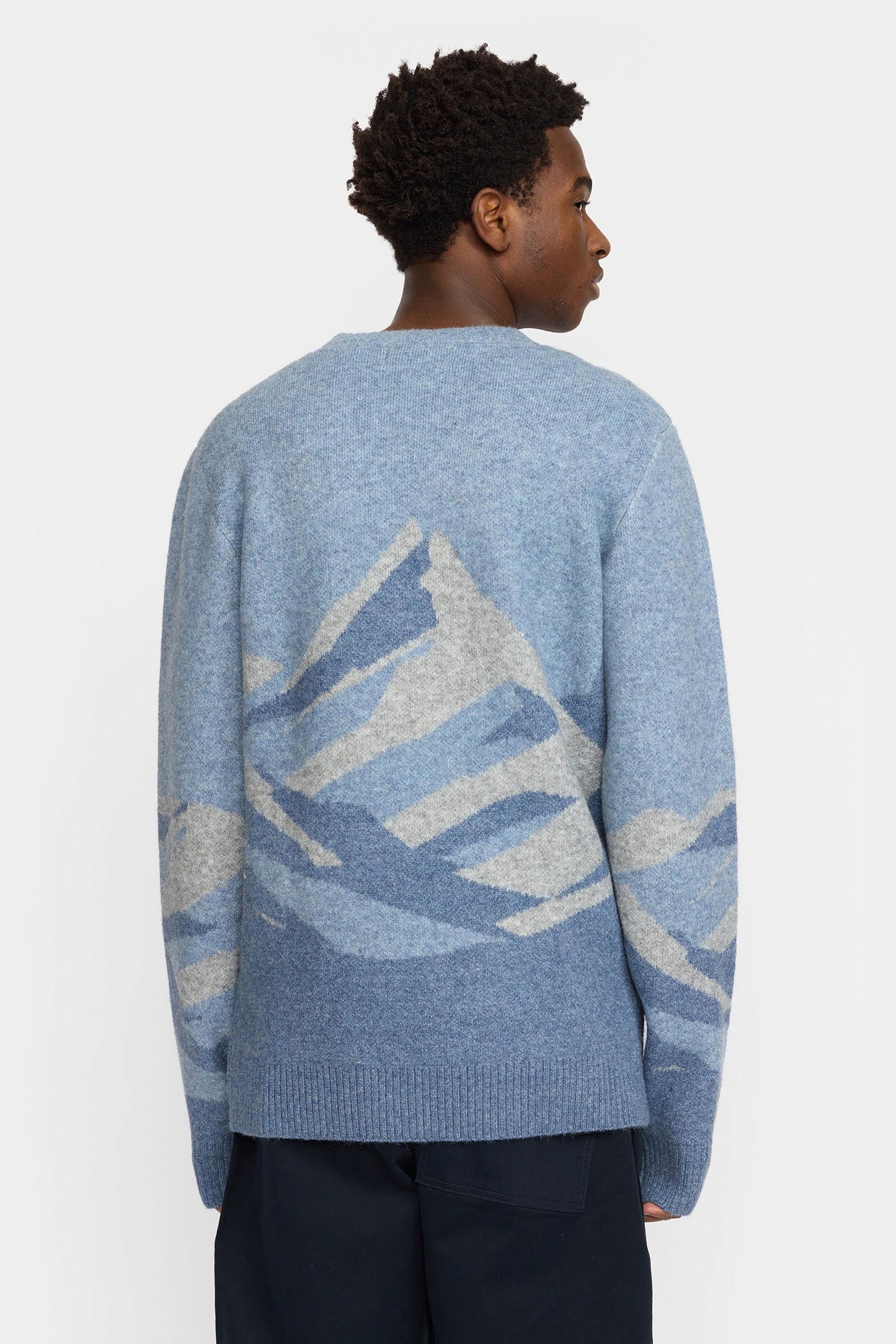 Revolution Blue sweater with abstract mountain design Pukas Surf Shop