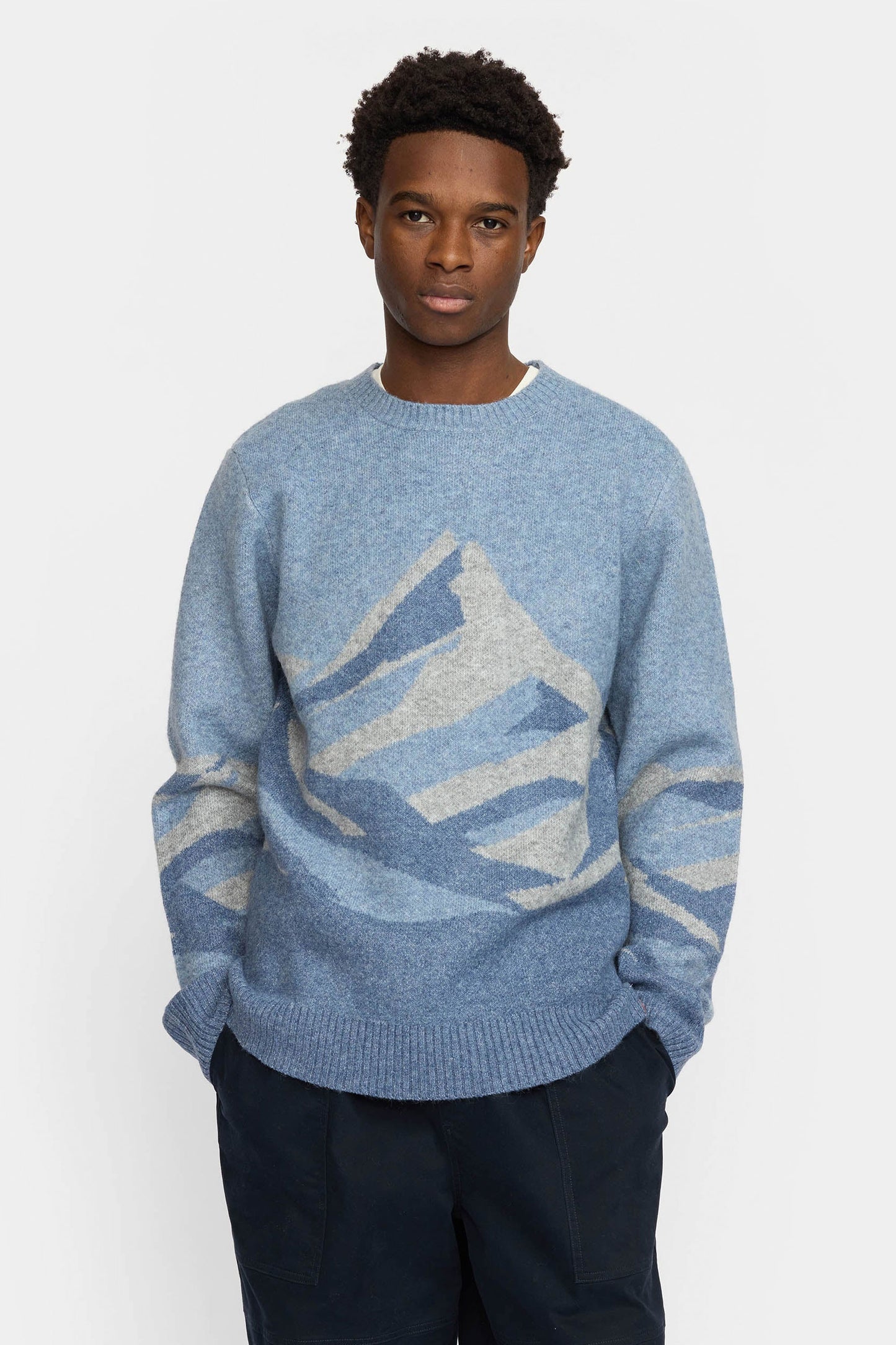 Revolution Blue sweater with a mountain design Pukas Surf Shop