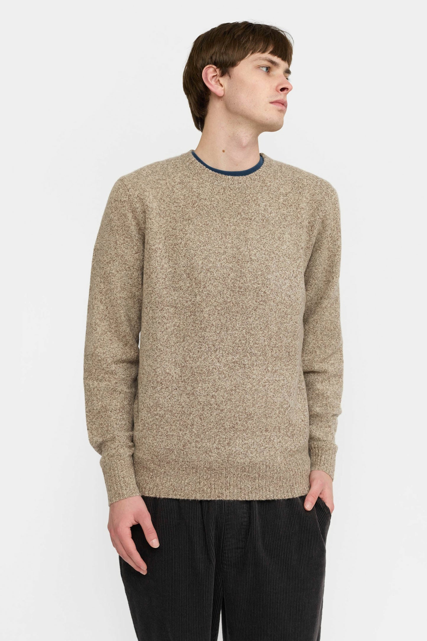 Revolution Beige sweater and black pants Pukas Surf Shop