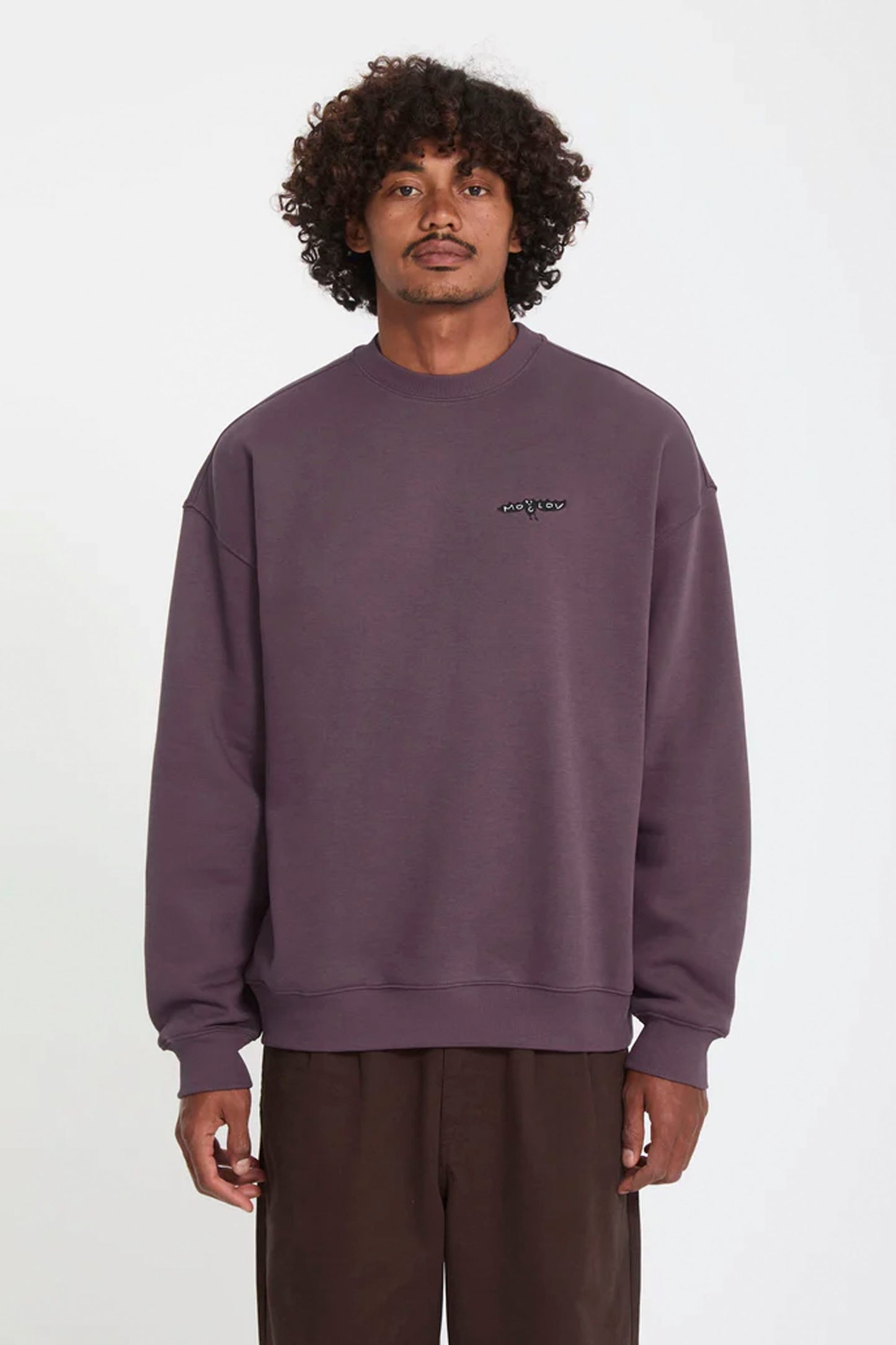 Man wearing Volcom Stone Gony Zubizarreta crew on a white background