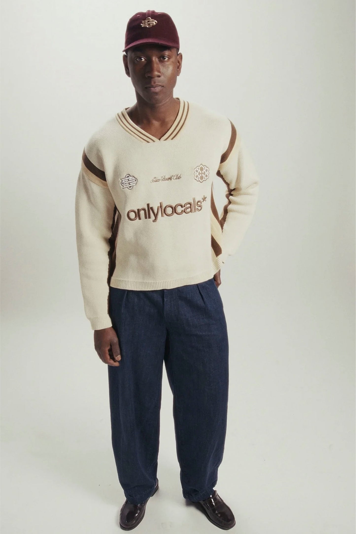 CUCO BOARD CLUB Locals Only varsity knit sweater in sand with chocolate stripes and multi-logo embroidery