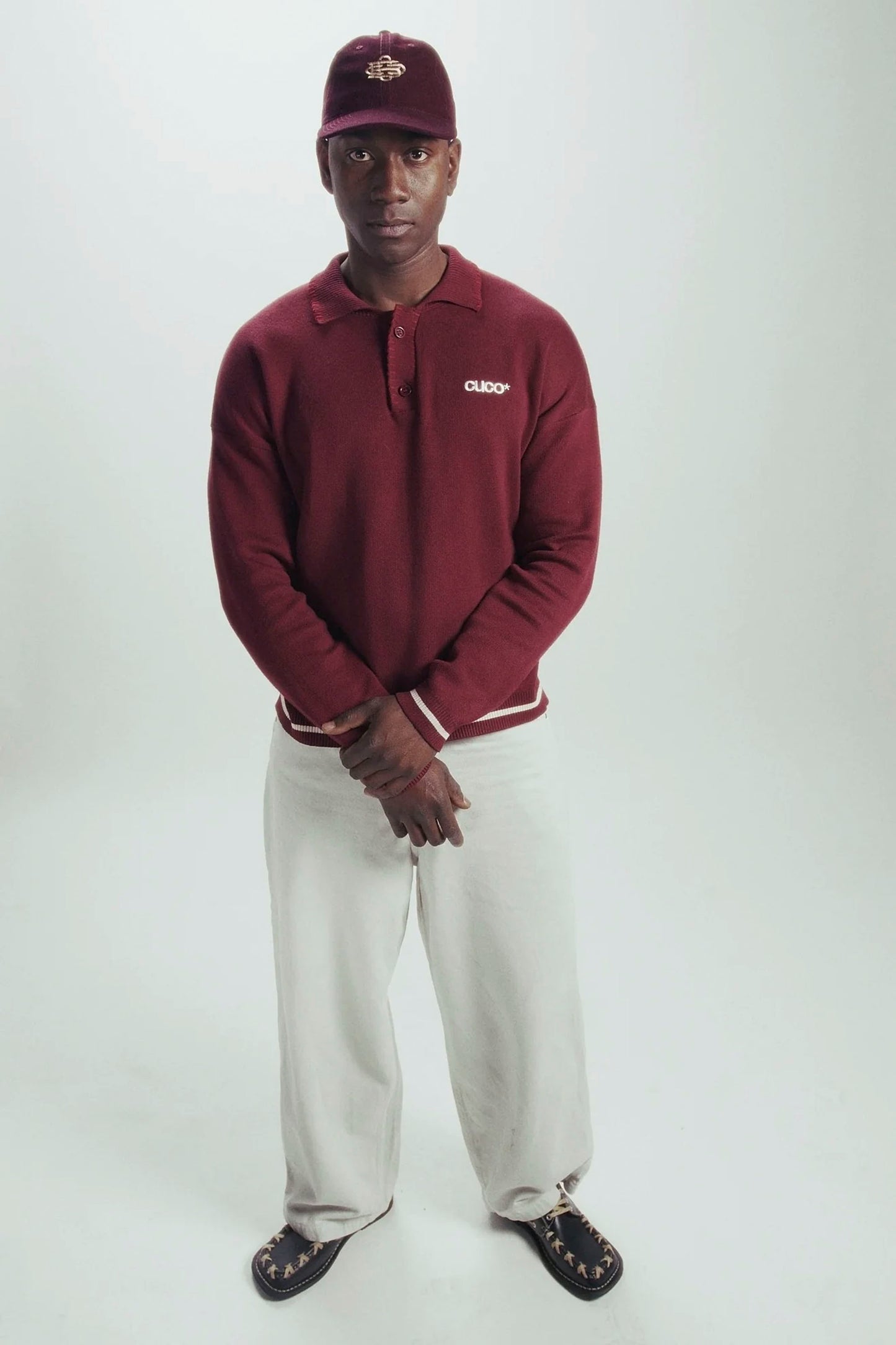 CUCO BOARD CLUB Ruby Polo long-sleeve knit sweater in deep ruby red with contrast stitching and retro stripes