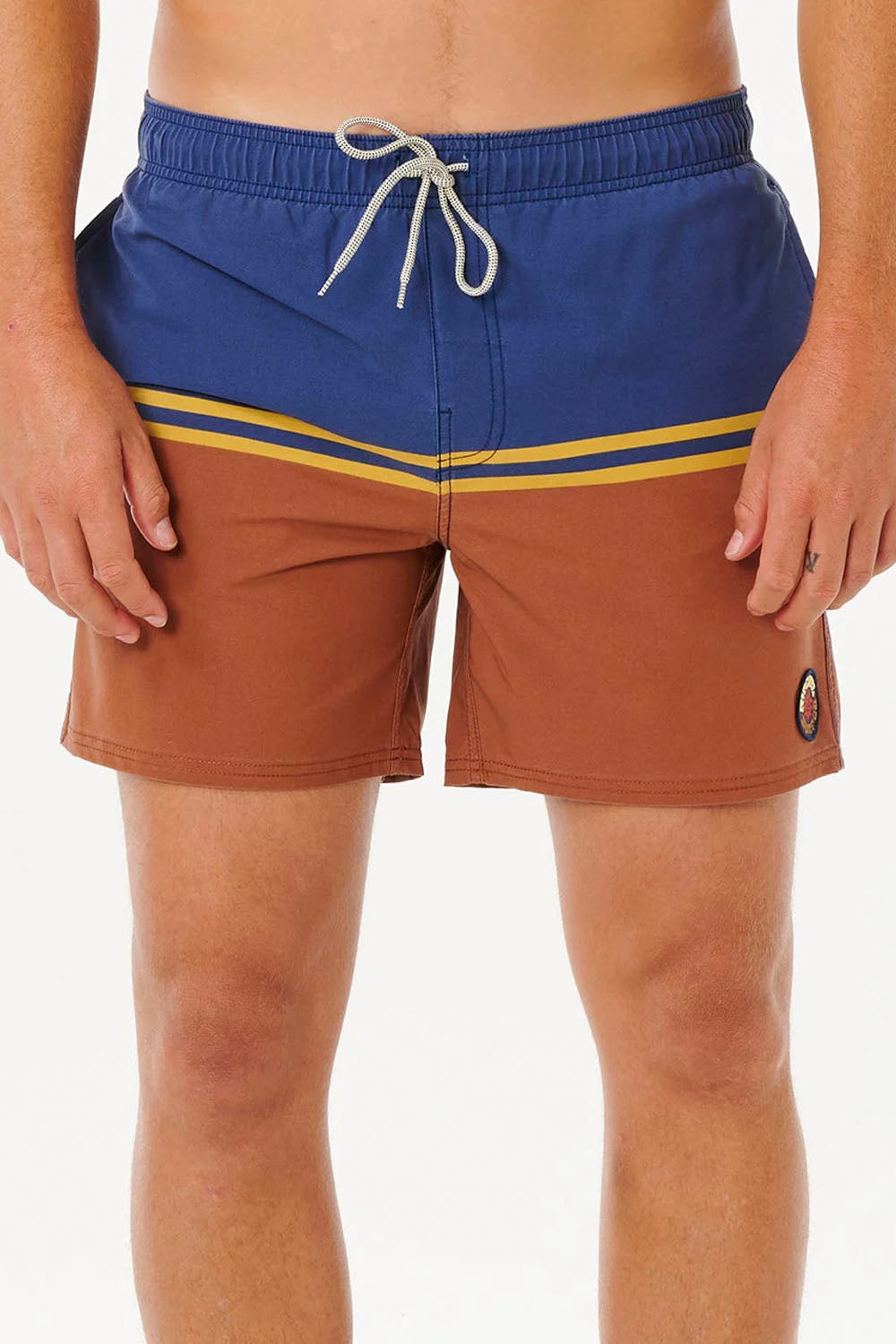 Blue and brown swim shorts with a yellow stripe on a white background