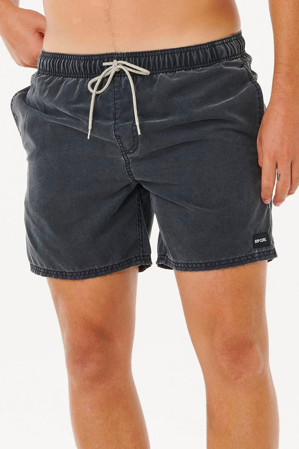 Black shorts with a drawstring on a white background