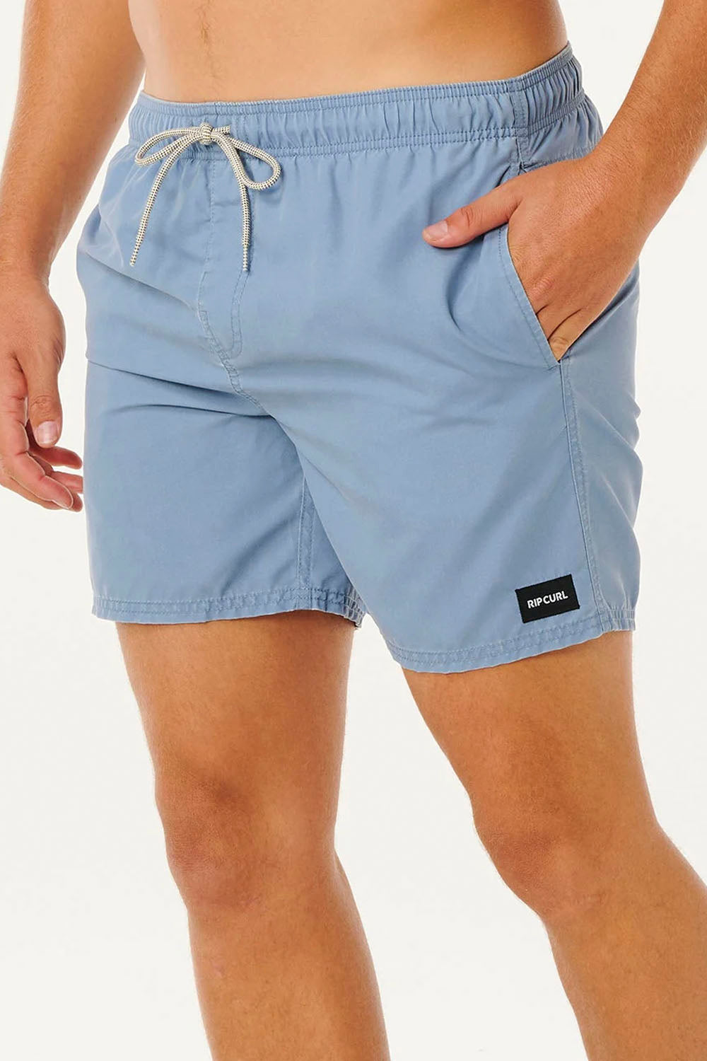 Light blue swim shorts with a brand logo on a white background
