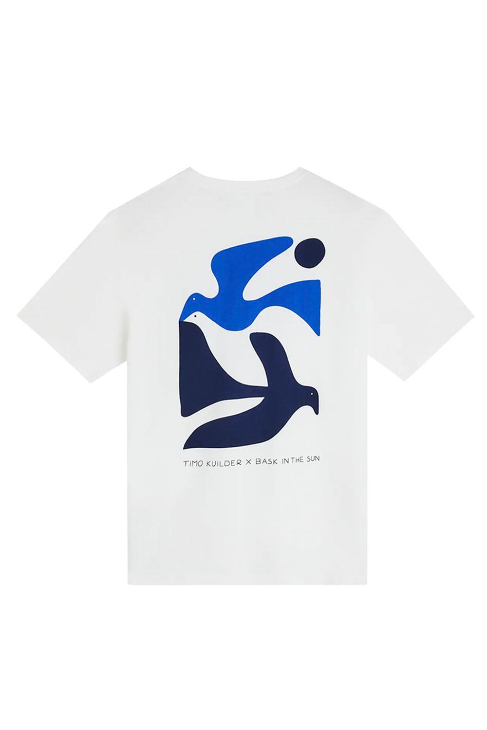 A white short-sleeve crewneck t-shirt featuring a large graphic print on the back. The graphic is a stylized abstract design in blue and navy, resembling a bird and a human figure, with small black text underneath reading 'TIMO KUILDER X BACK IN THE SUN