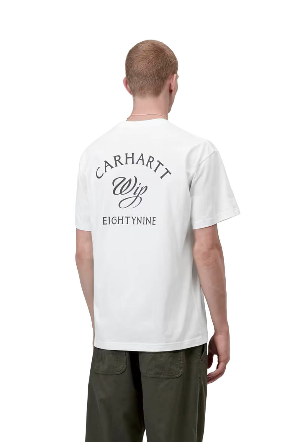Person wearing a white Carhartt t-shirt with branding on the back