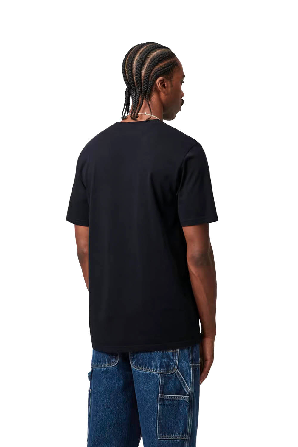 Person wearing a dark navy t-shirt and blue jeans on a white background