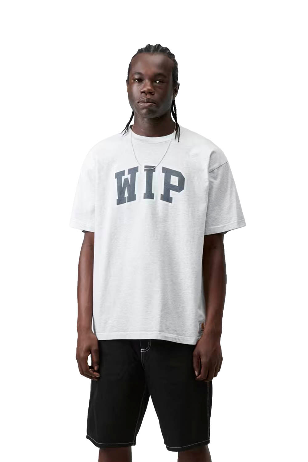 Person wearing a white t-shirt with 'WIP' text on a white background