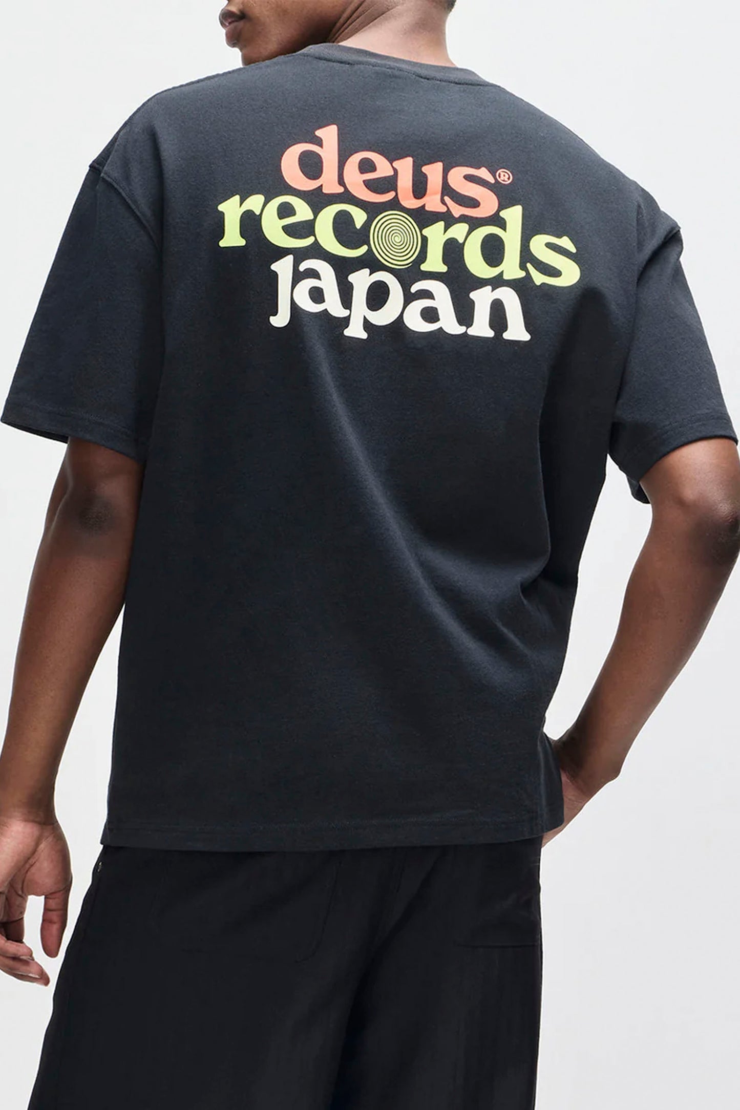 Deus Strata tee in black for men - essential coastal lifestyle apparel at Pukas Surf Shop
