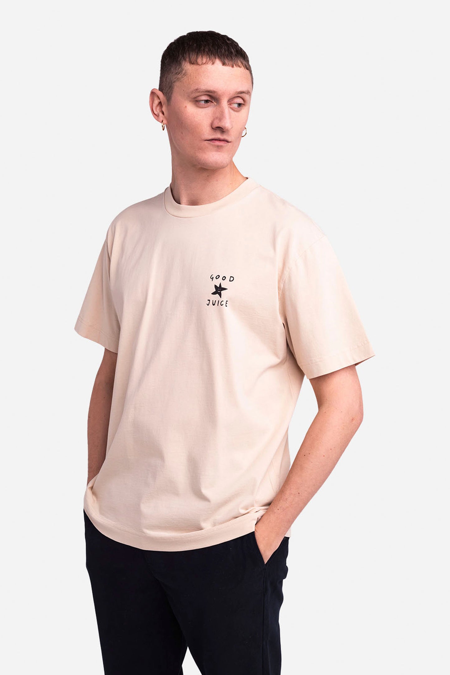 Olow Pukas Surf Shop cream loose tee with subtle graphic prints relaxed drape