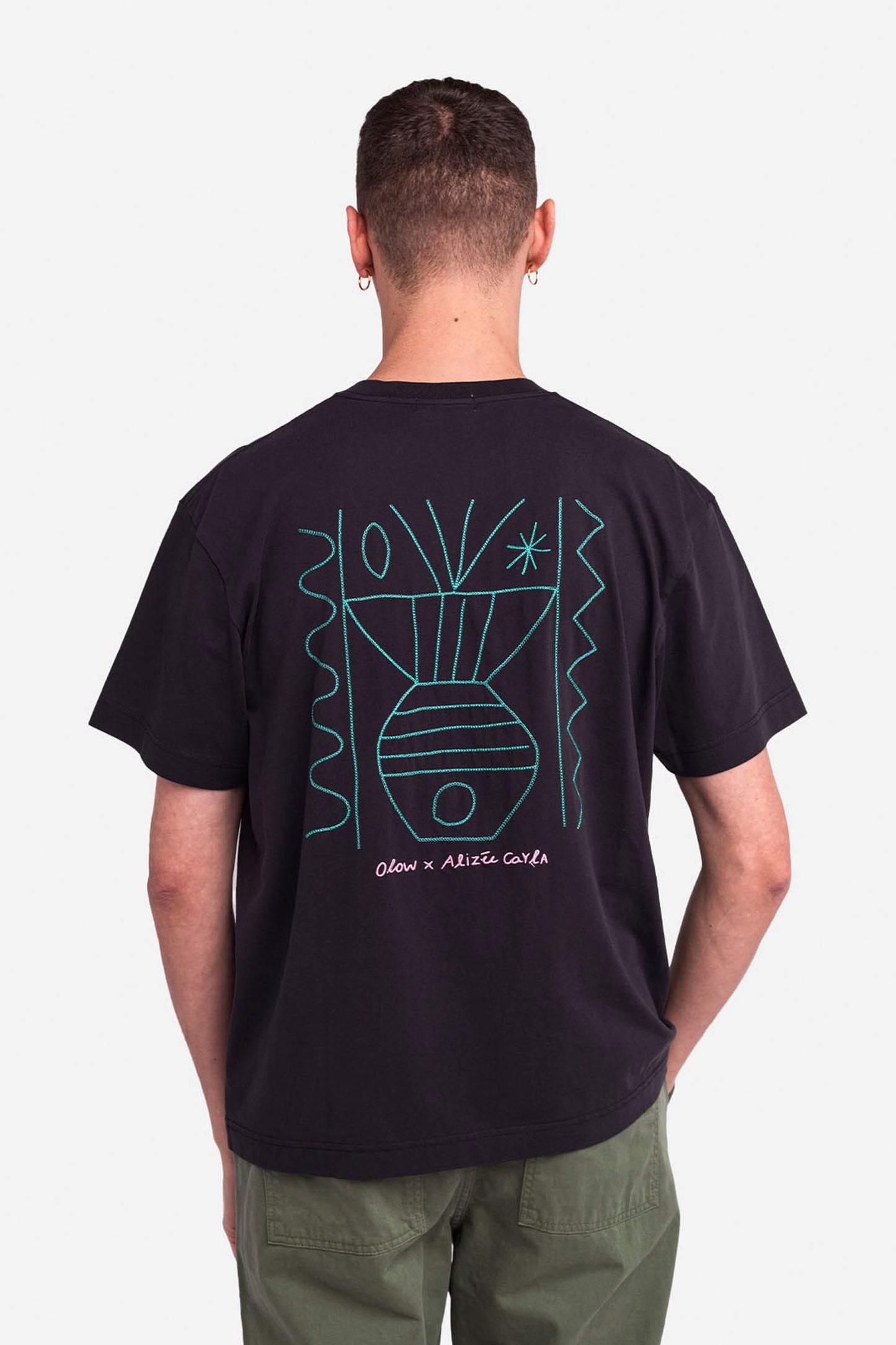 Pukas Surf Shop black loose-fit tee embroidered back and front design organic cotton