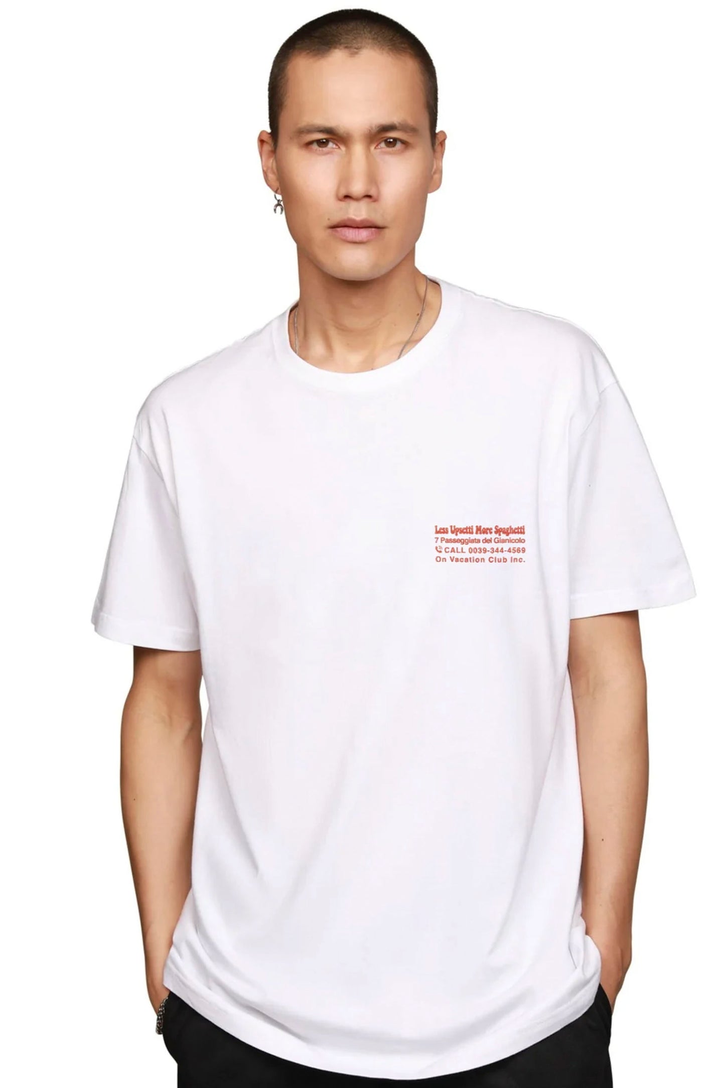 Man wearing a white t-shirt with text on a white background