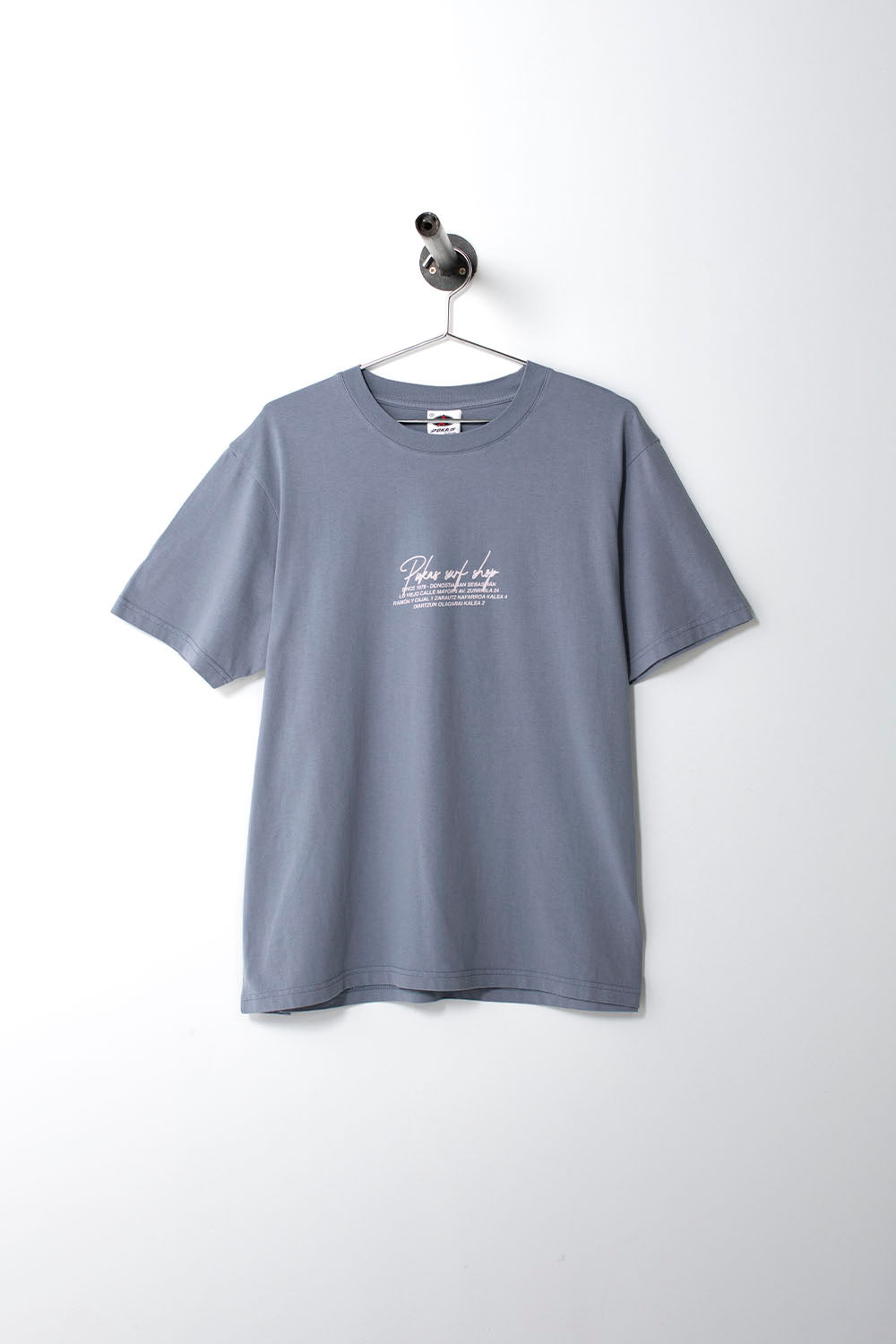 Gray t-shirt with white text on a hanger against a white background