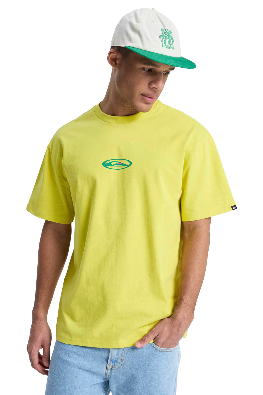 Man wearing a bright yellow t-shirt with a logo and a white cap with green brim and logo.