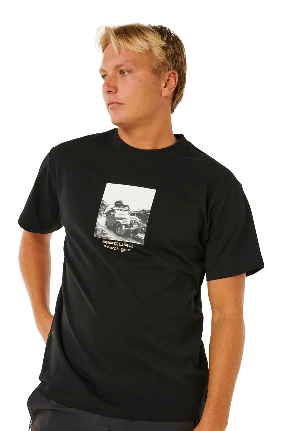 Man wearing a black t-shirt with a graphic design on a white background