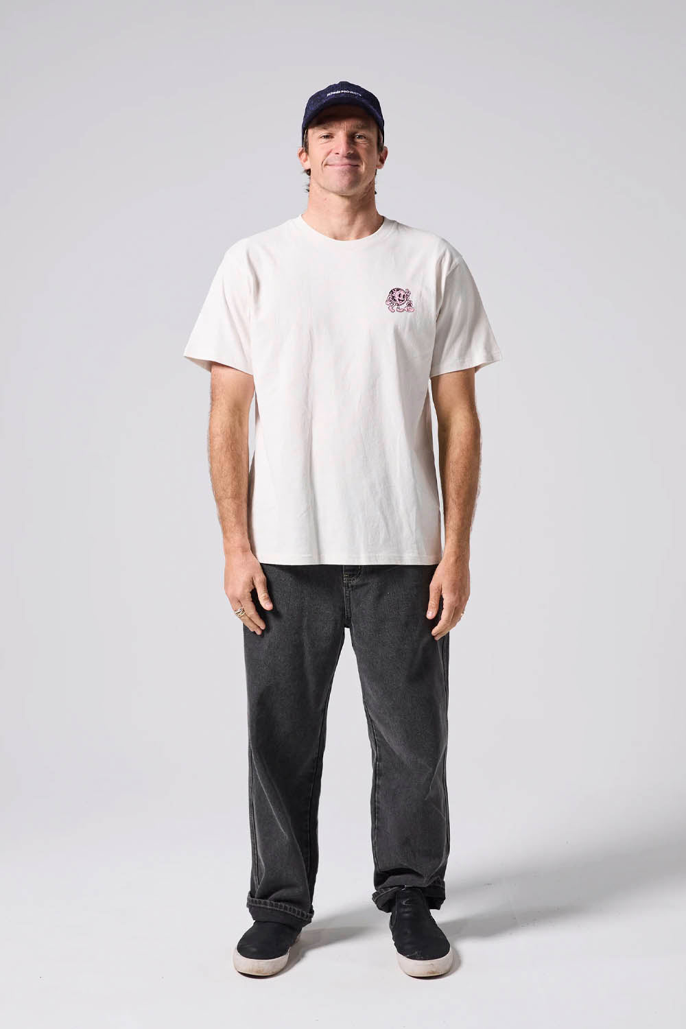 Rivvia Projects Happy Globe T-Shirt Bone – front graphic, soft hand plastisol print