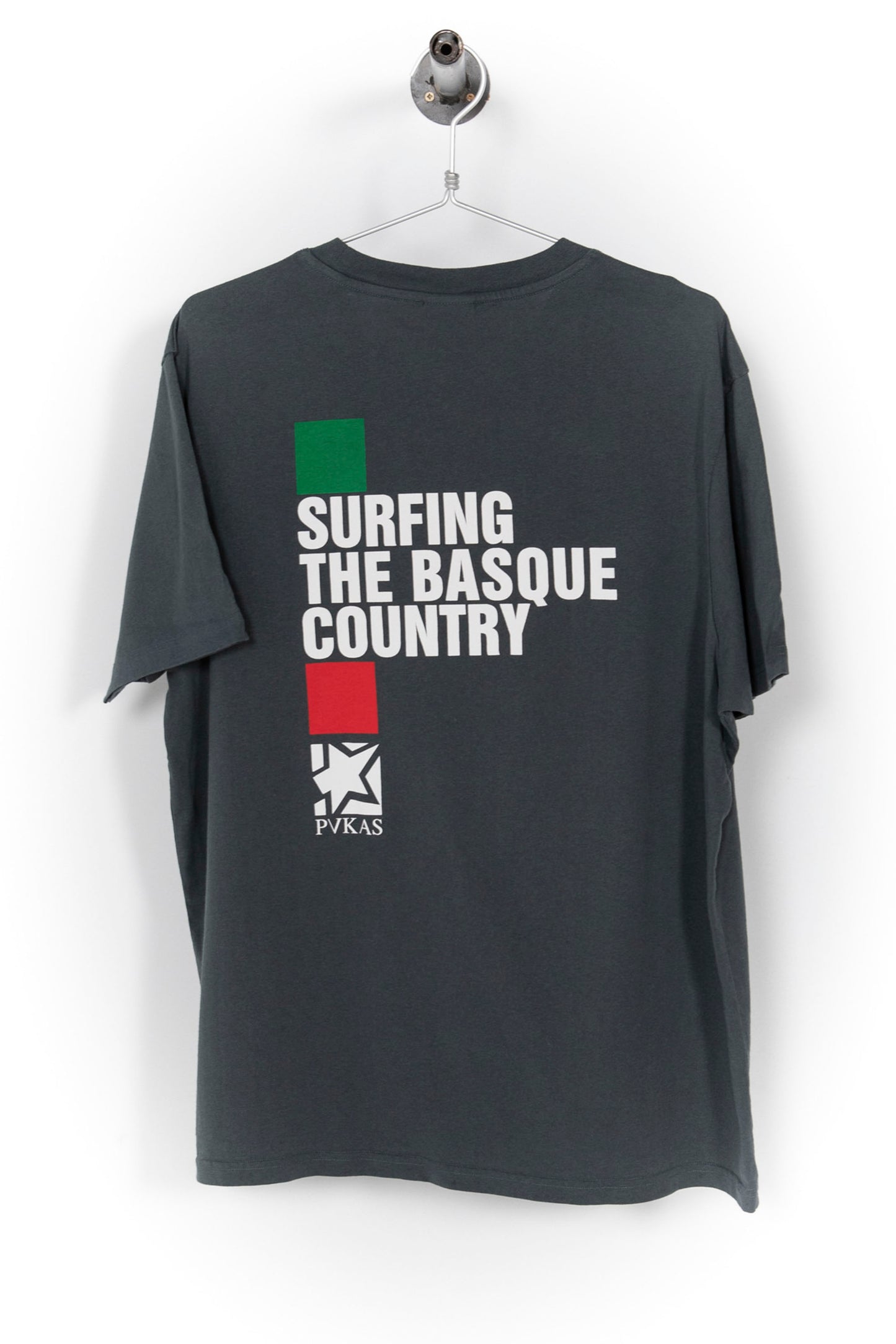 Pukas Surf Shop charcoal t-shirt Surfing the Basque Country front logo and bold back print