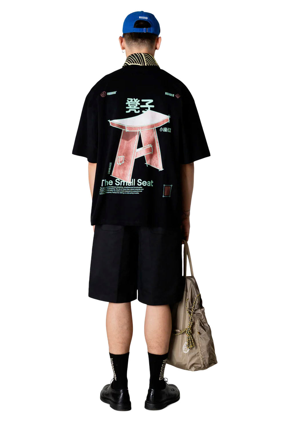 Woodbird Wbbeam Seat Tee in Black – front, back and detail views on model
