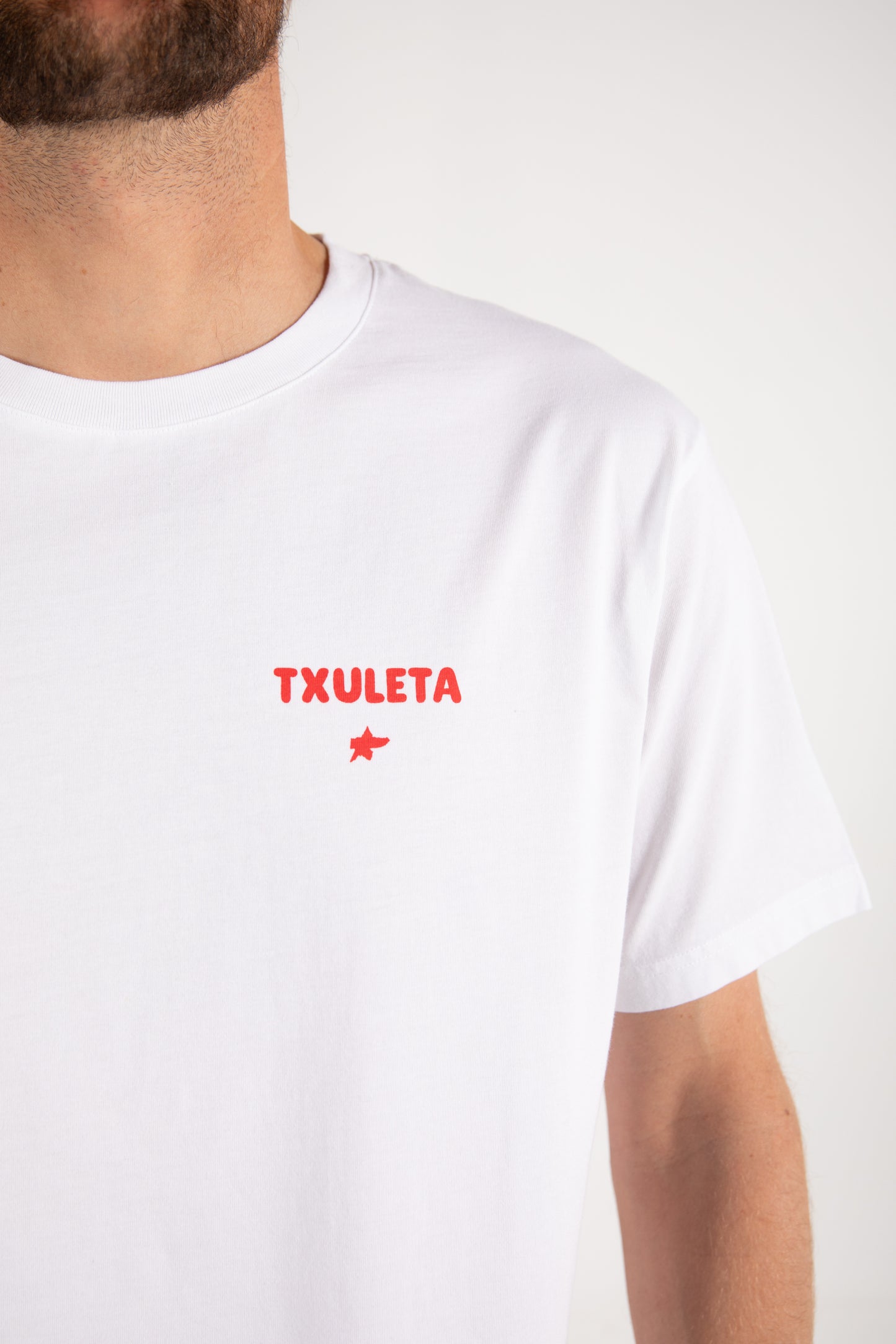 
                  
                    Pukas-Surf-Shop-Surfing-The-Basque-Country-txuleta-tee-man-white
                  
                