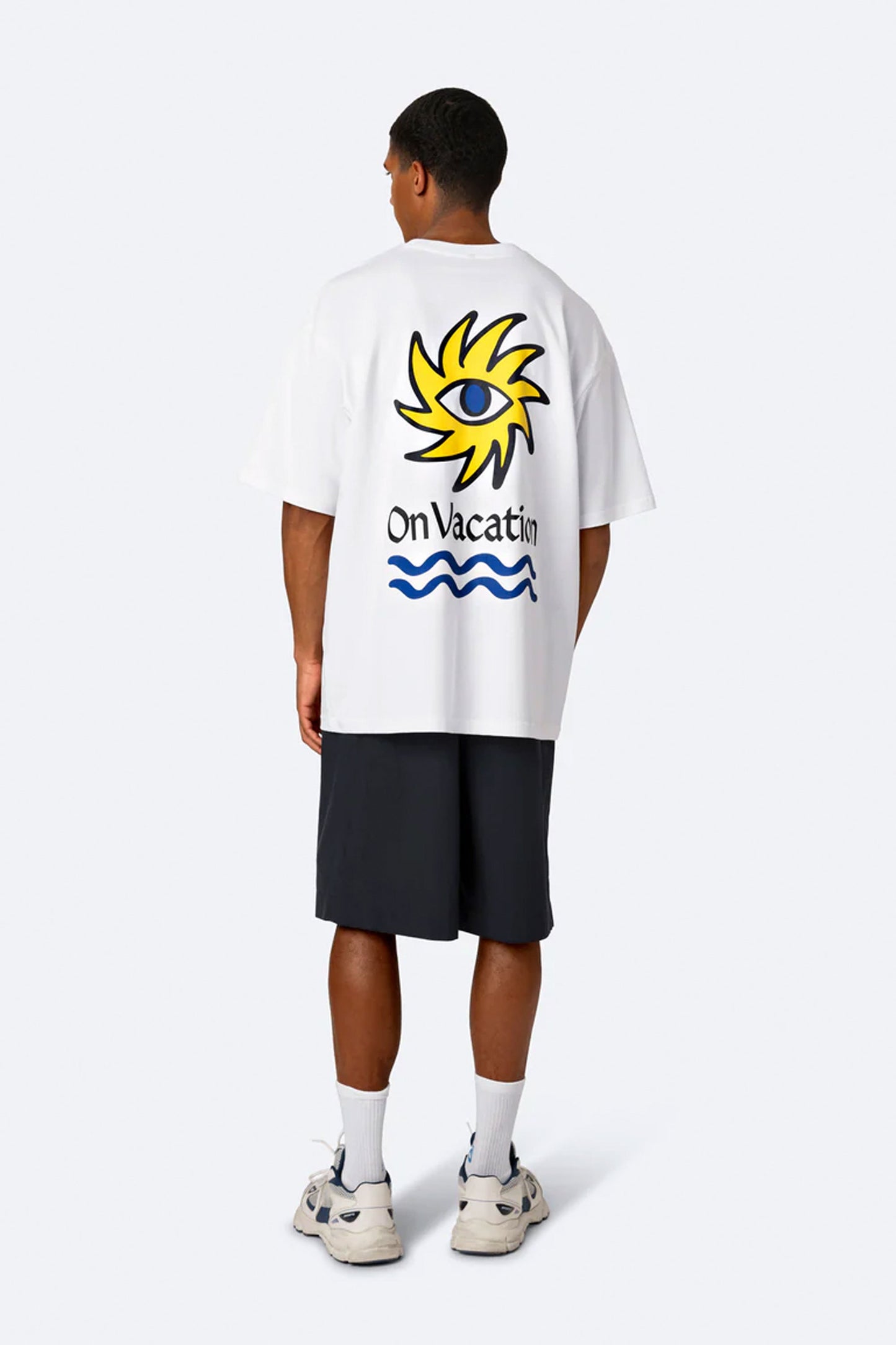 Pukas-Surf-Shop-Tee-On-Vacation-sun-eye-white