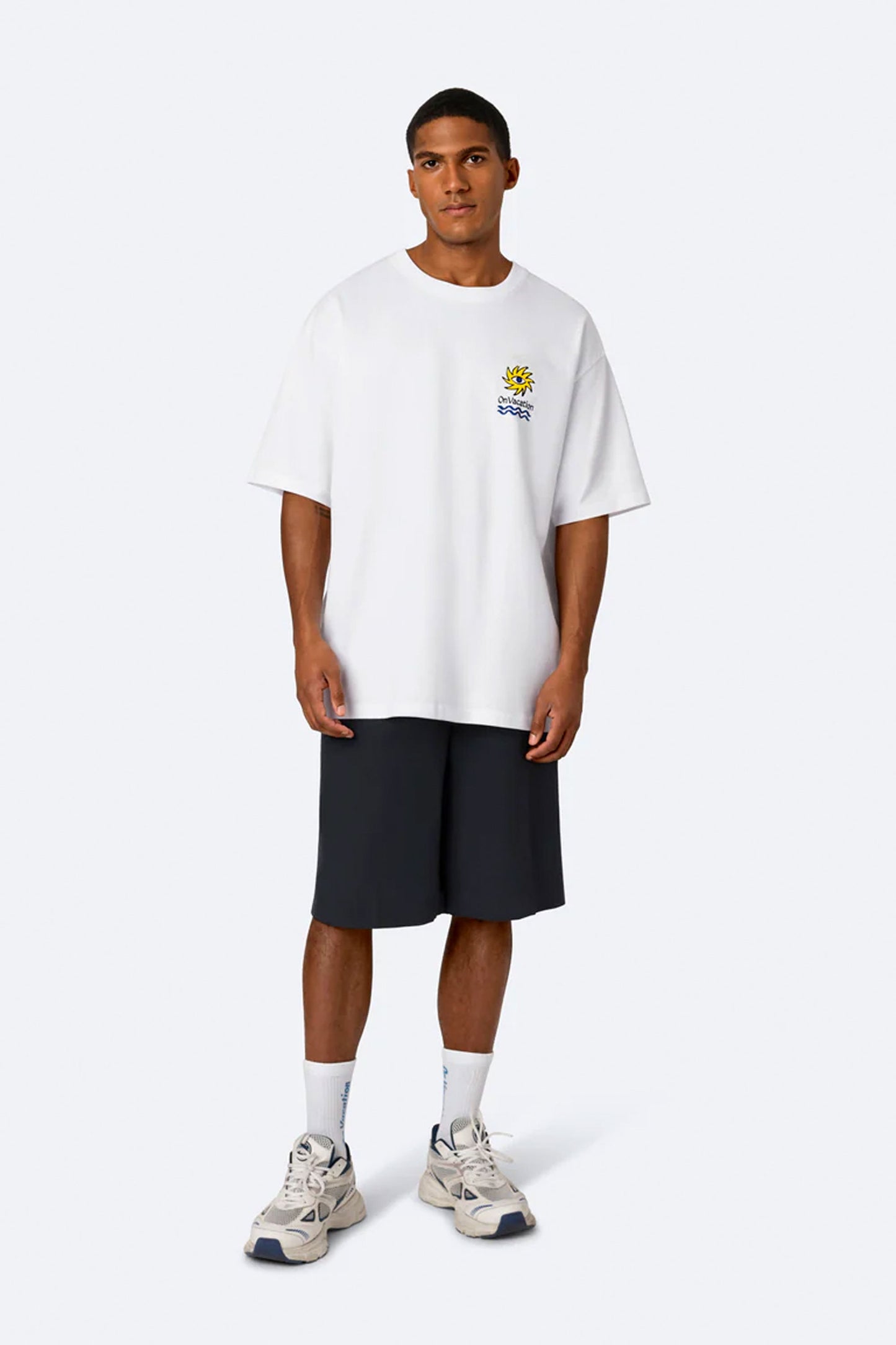 Pukas-Surf-Shop-Tee-On-Vacation-sun-eye-white