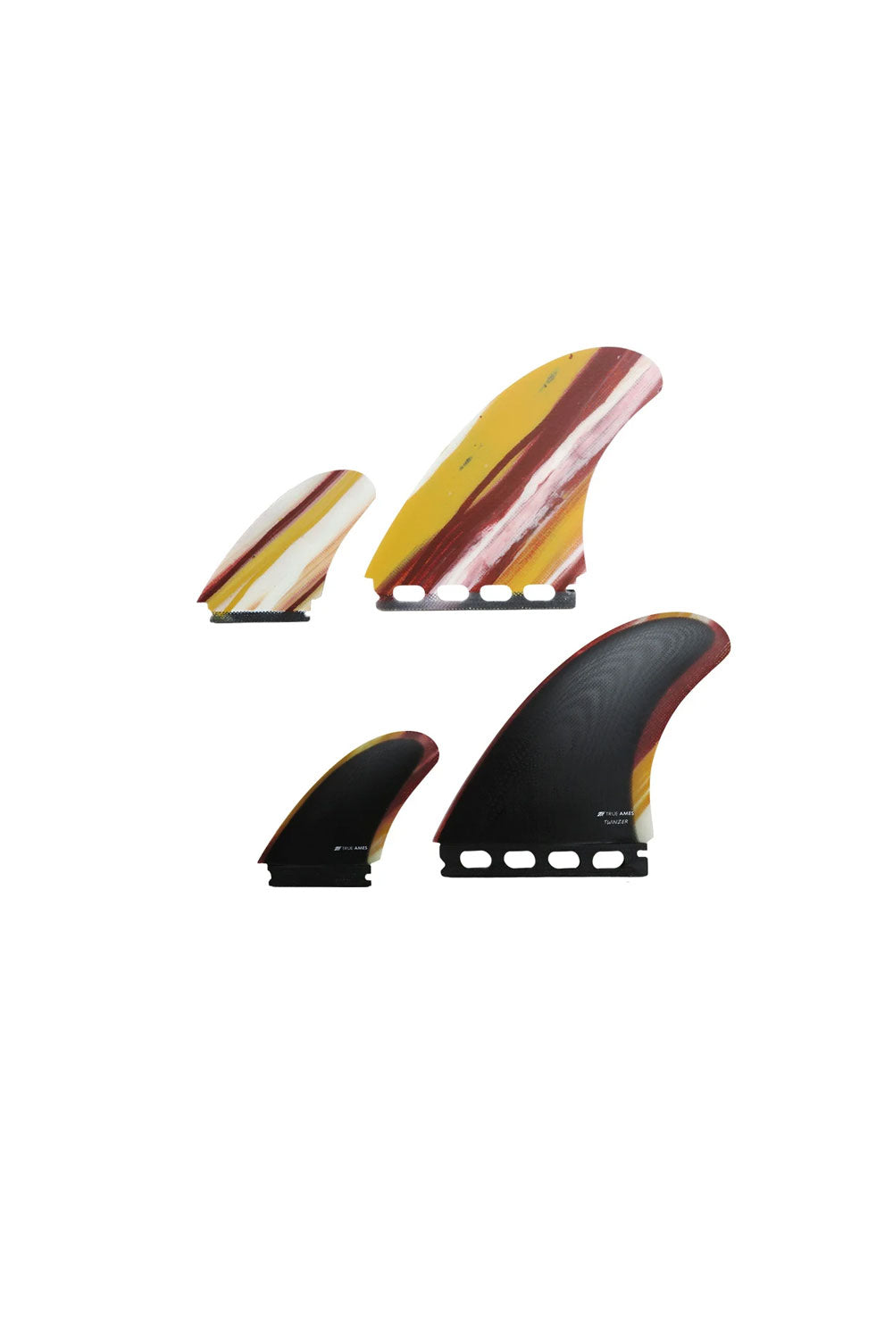 Four surfboard fins arranged on a plain white background, including two larger fins and two smaller fins, with color combinations of yellow, red, black, and white.