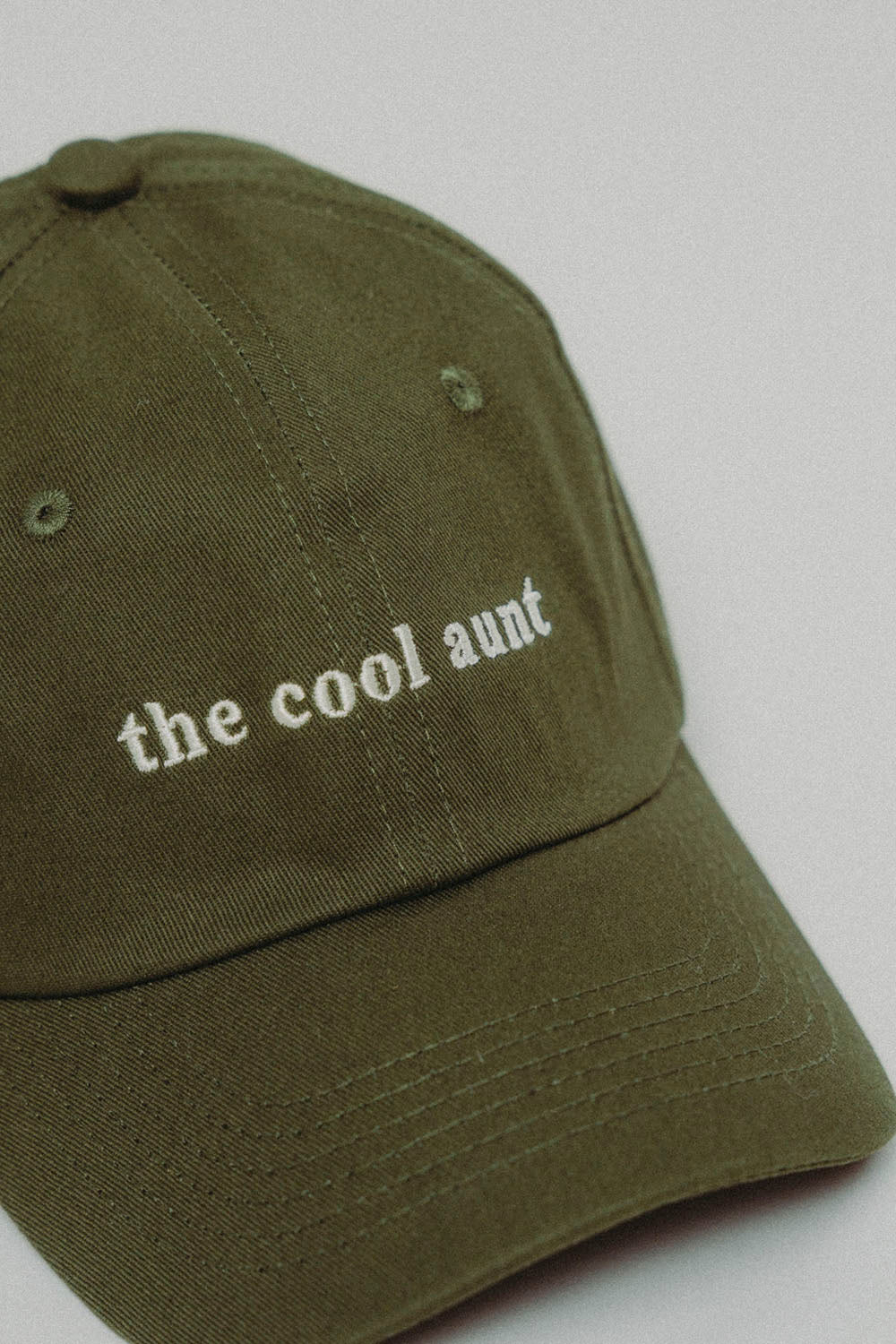 Olive green 100% cotton baseball cap with an embroidered ram logo on the back, an easy unisex pick for sunny days. Available Online at Pukas Surf Shop.