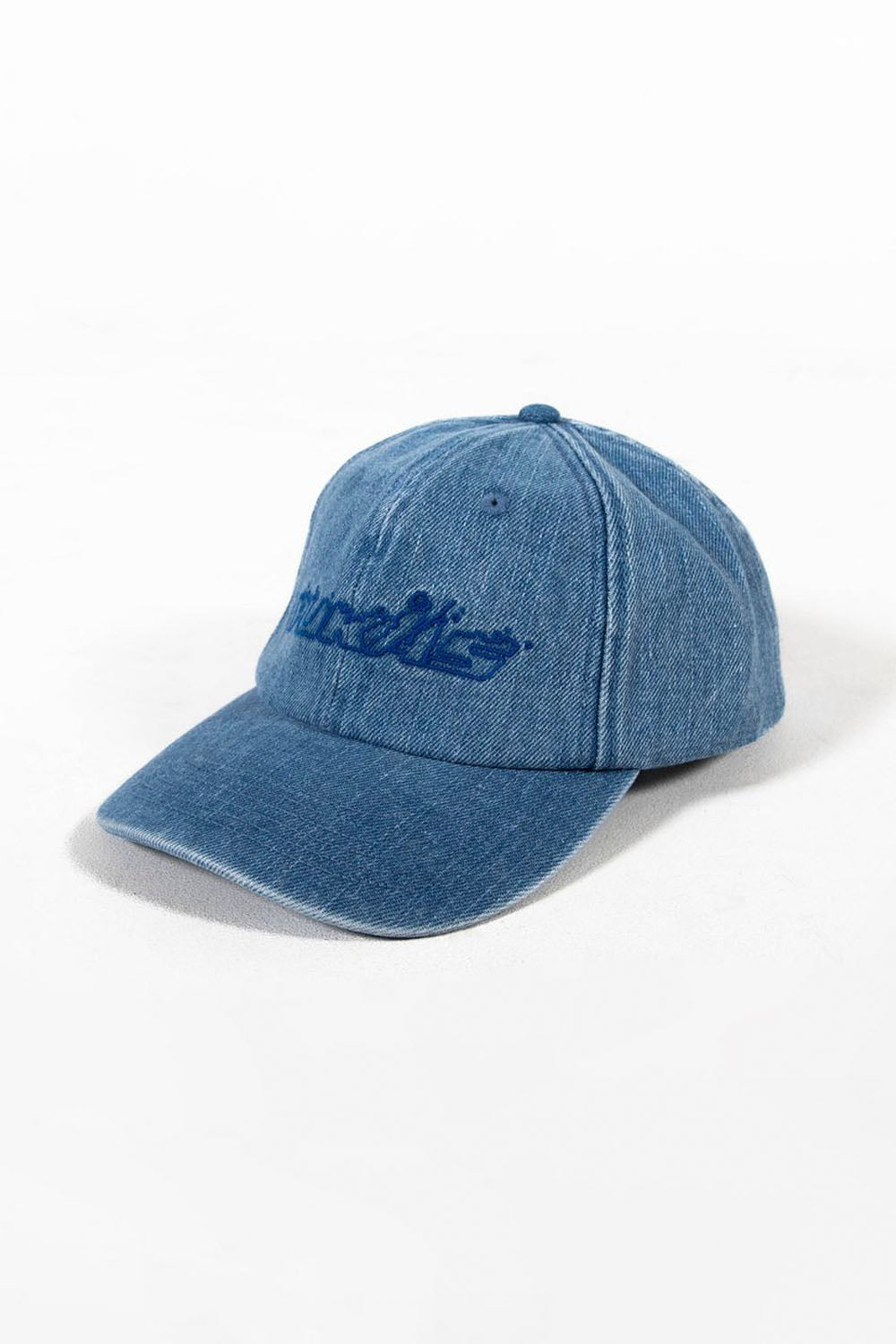 Blue denim cap with a brand logo on a white background