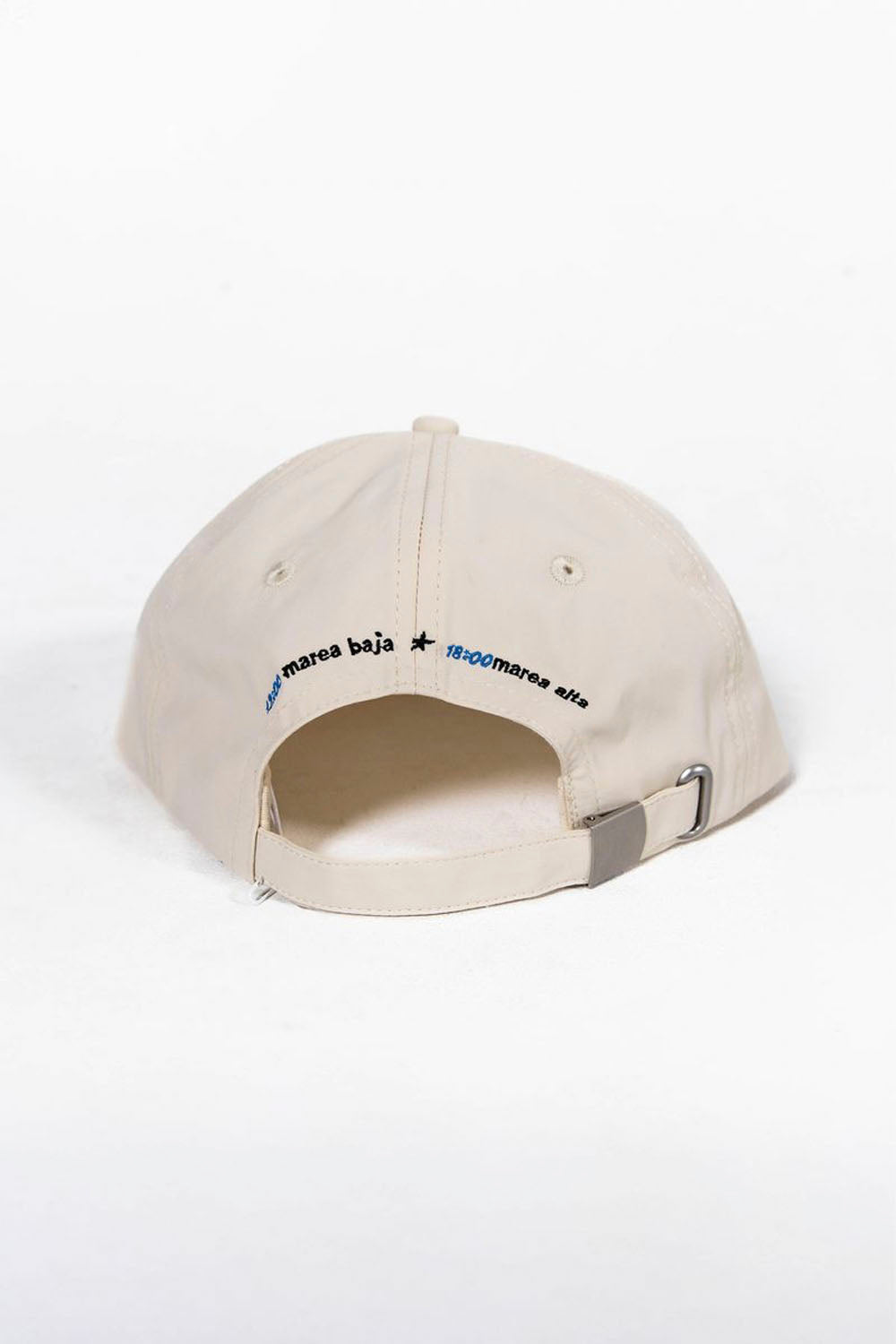 Beige cap with text on a white background