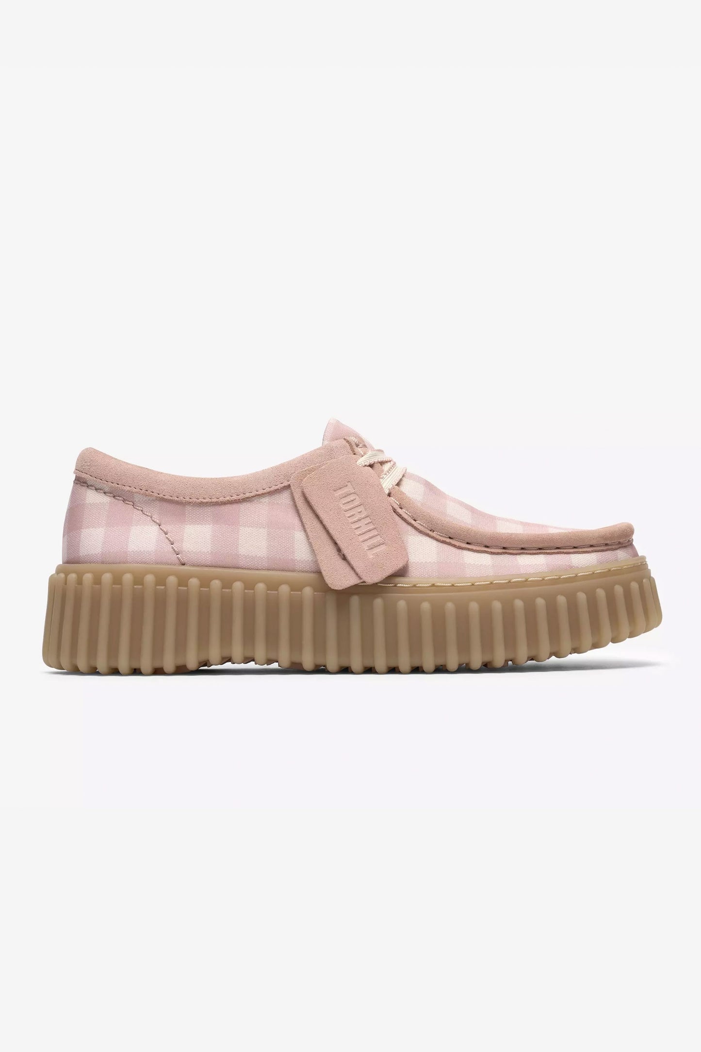 Light pink Clarks Tornhill Bee shoe with a checkered sole on a white background