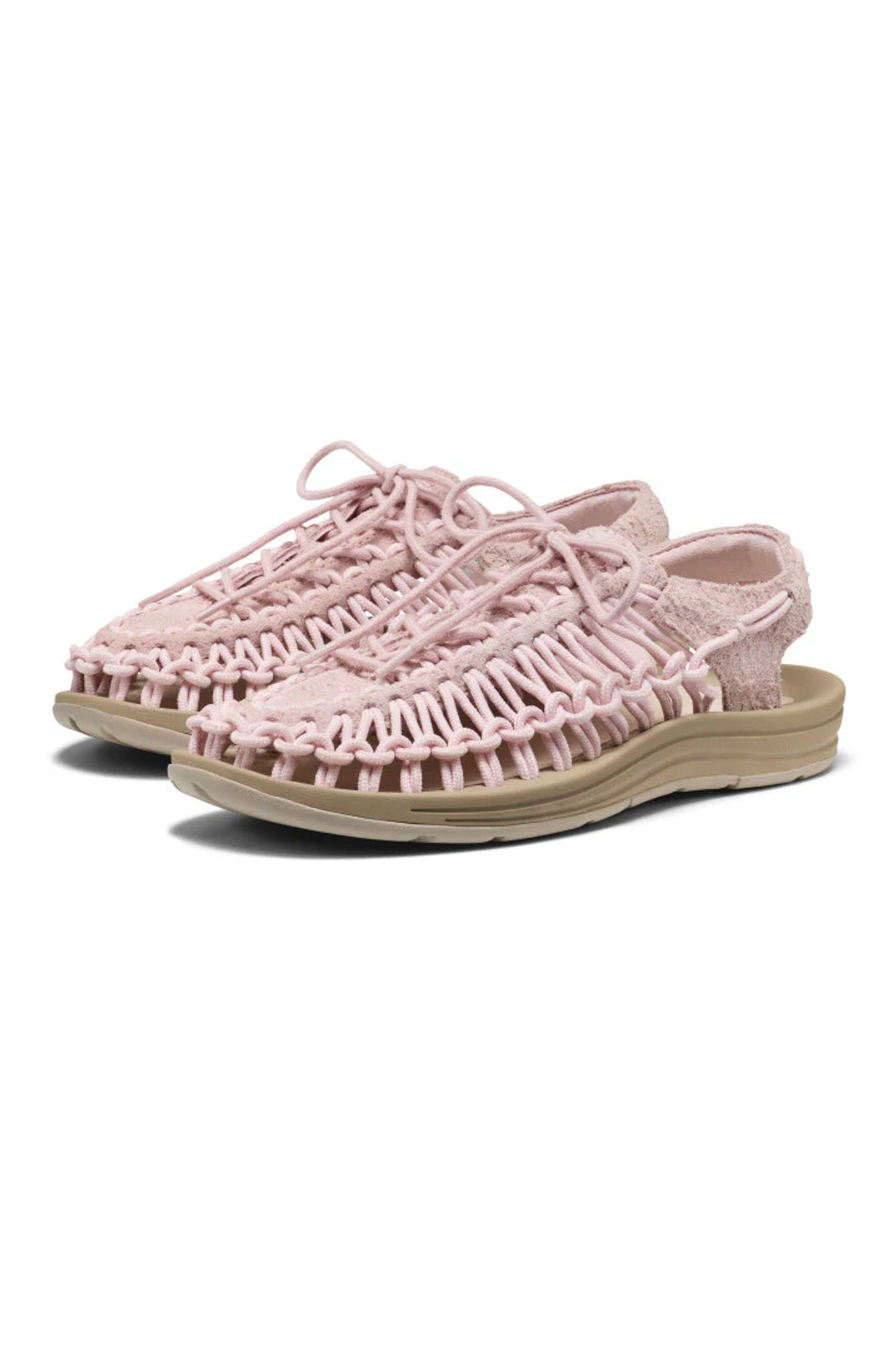 A pair of Pink Keen Uneek shoes in white background