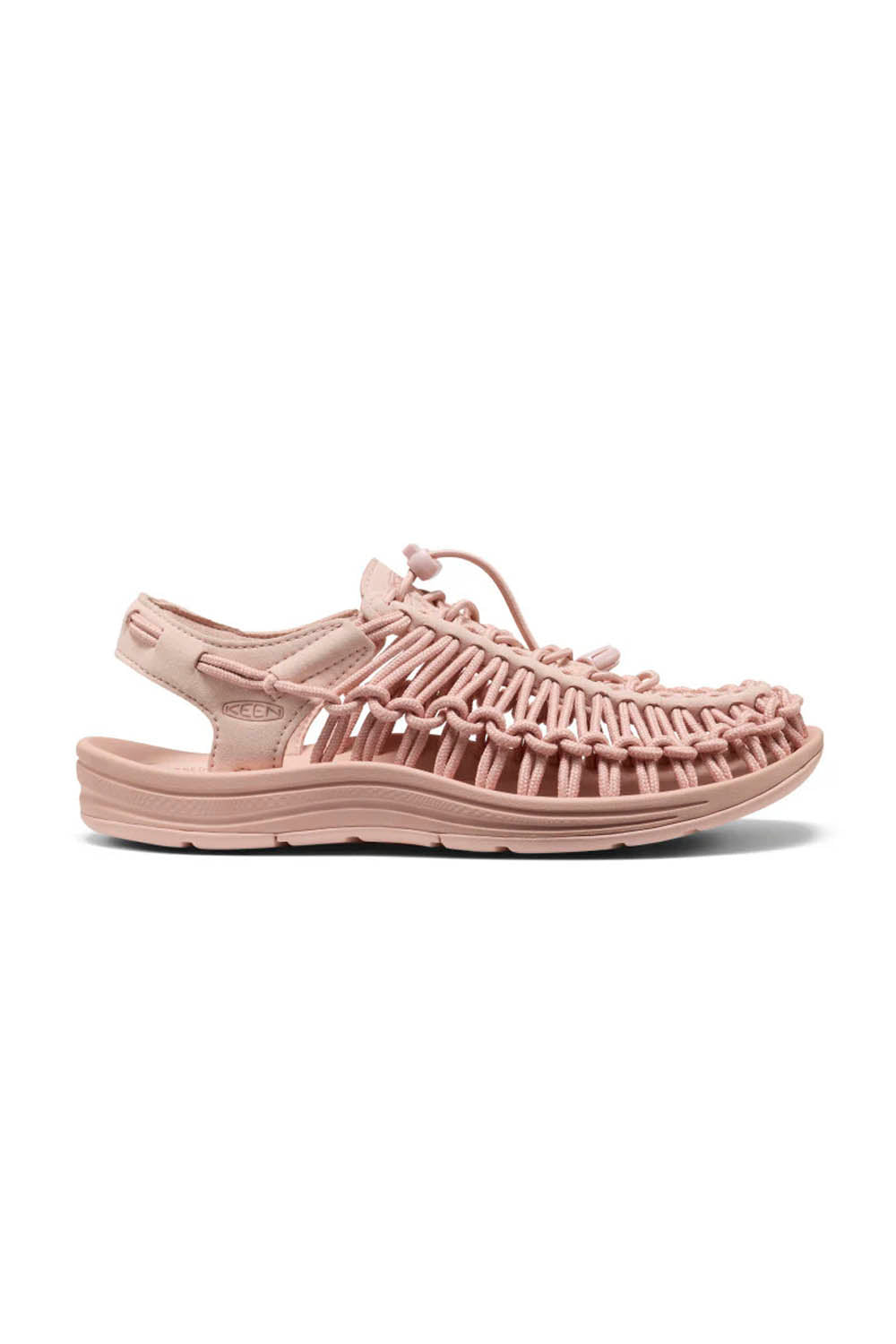 Pink sandal with macrame straps on a white background