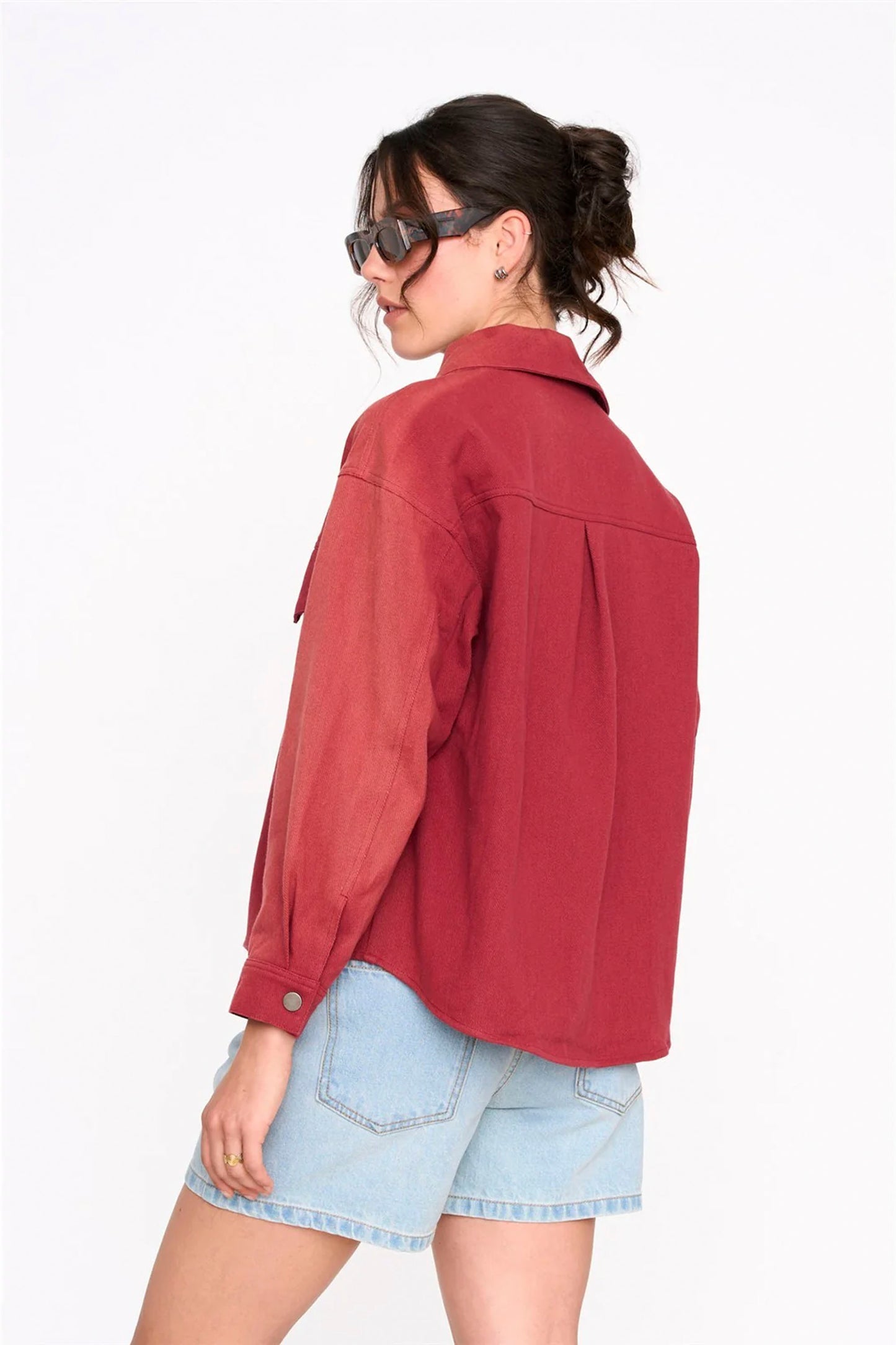 Woman wearing 24COLOURS Red Jacket on a white background