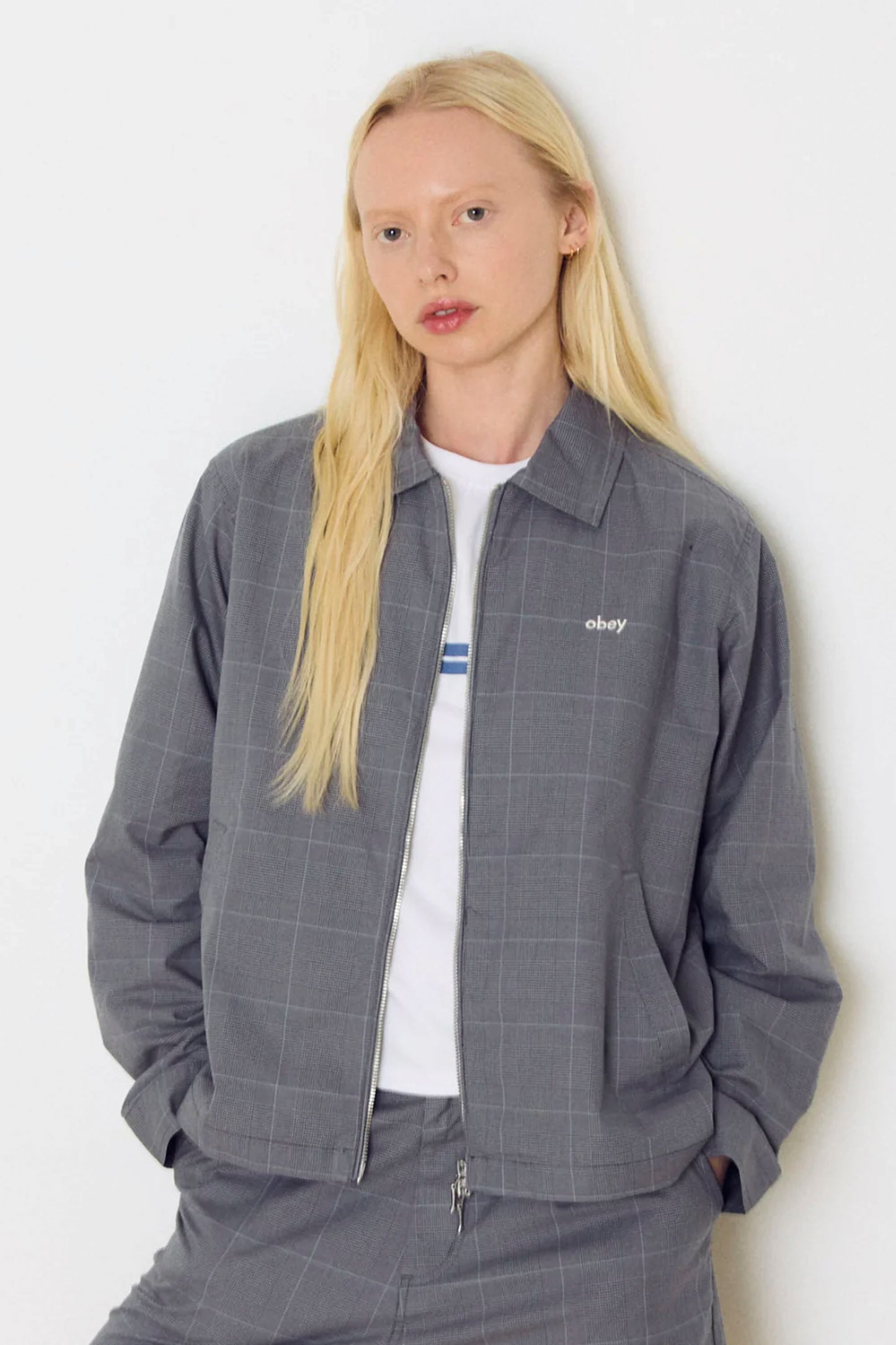 OBEY Olivia Plaid Jacket in grey - woman wearing yarn-dyed twill plaid jacket with adjustable cuffs