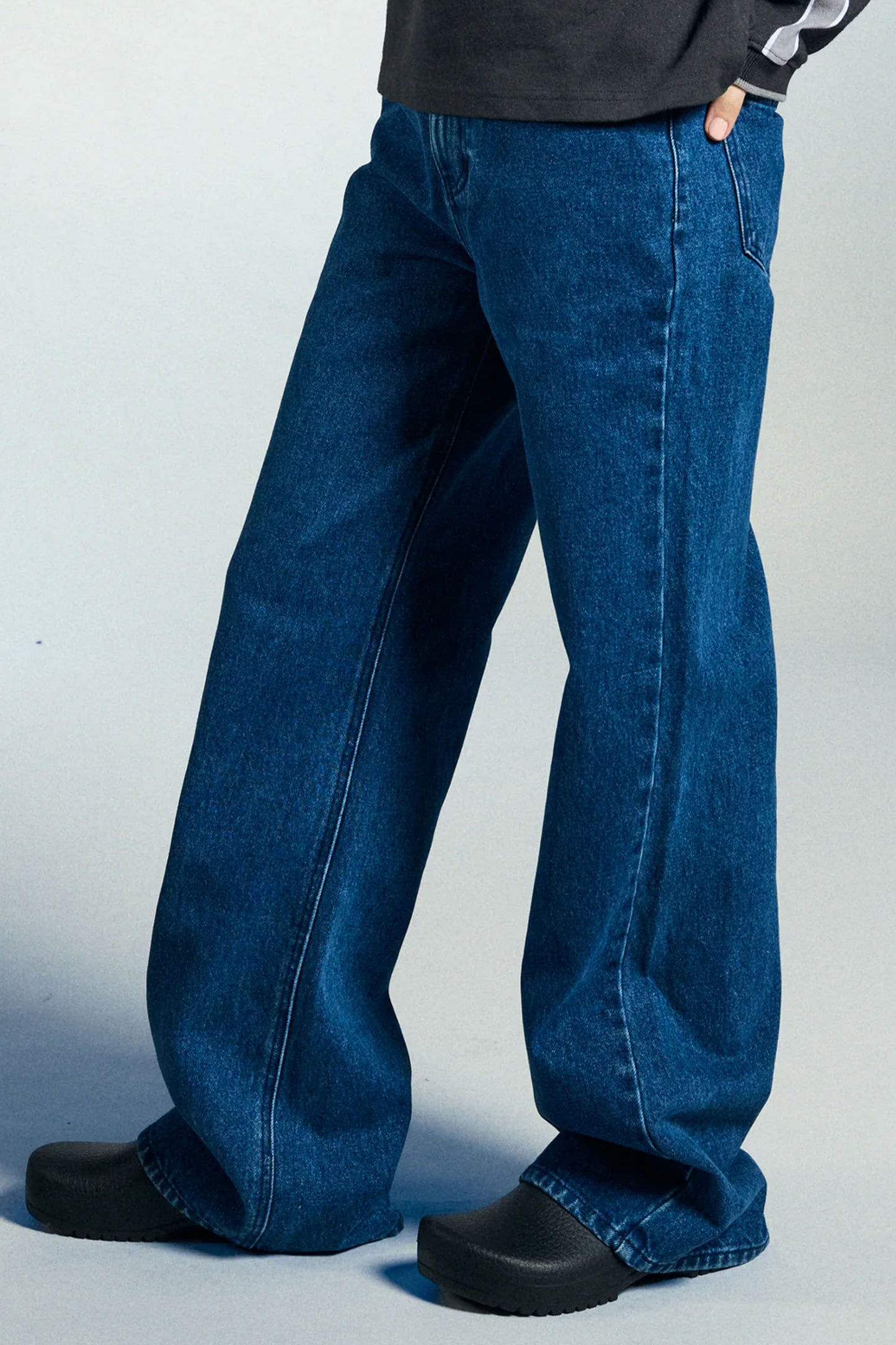 Person wearing Obey blue jeans Pukas Surf Shop