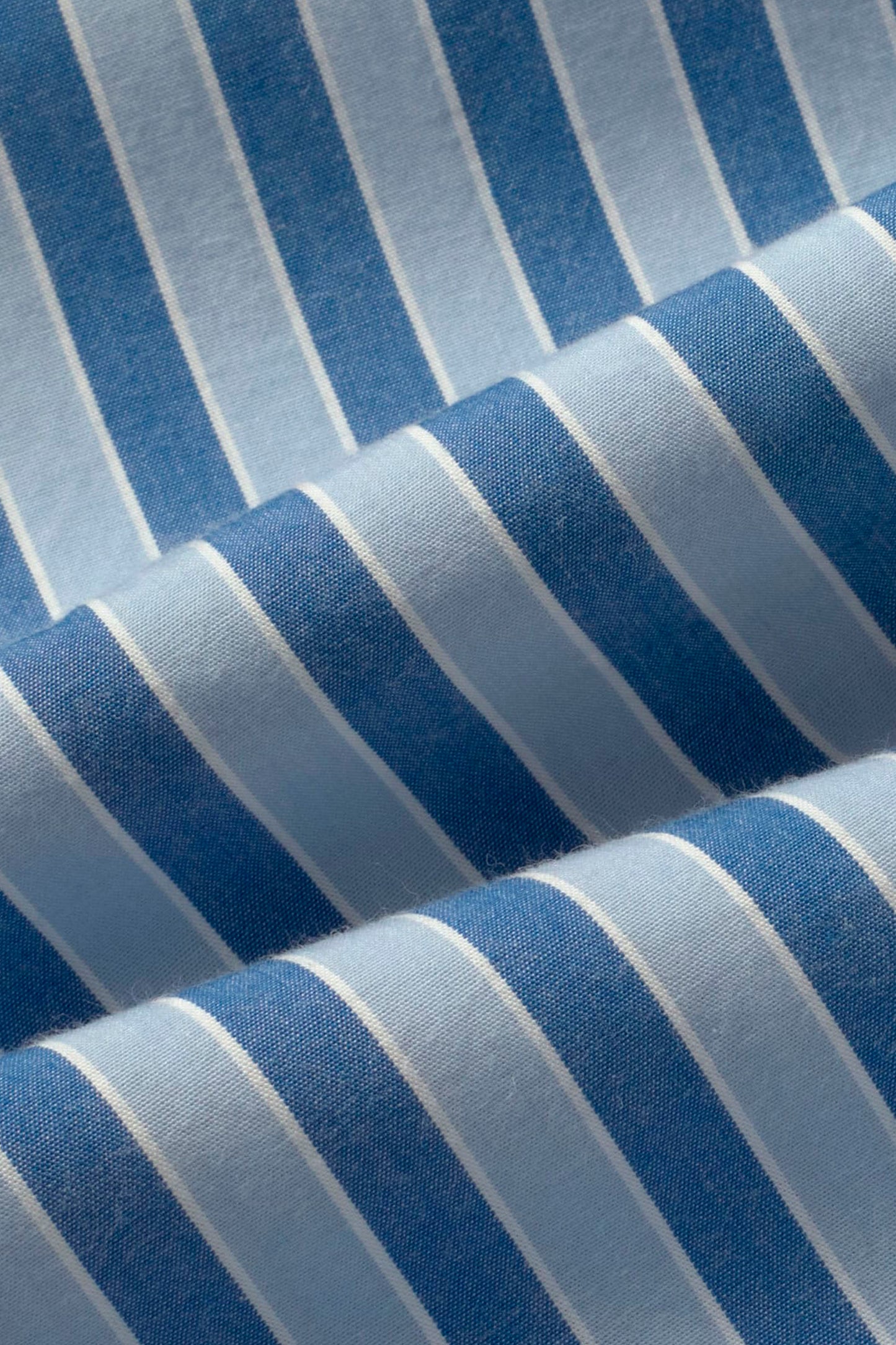 Close-up of blue and gray striped fabric