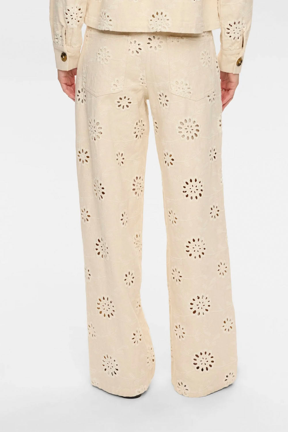 NÜMPH Nuenora Pants in Irish Cream – women's fluid wide-leg trousers in warm cream, available at Pukas Surf Shop