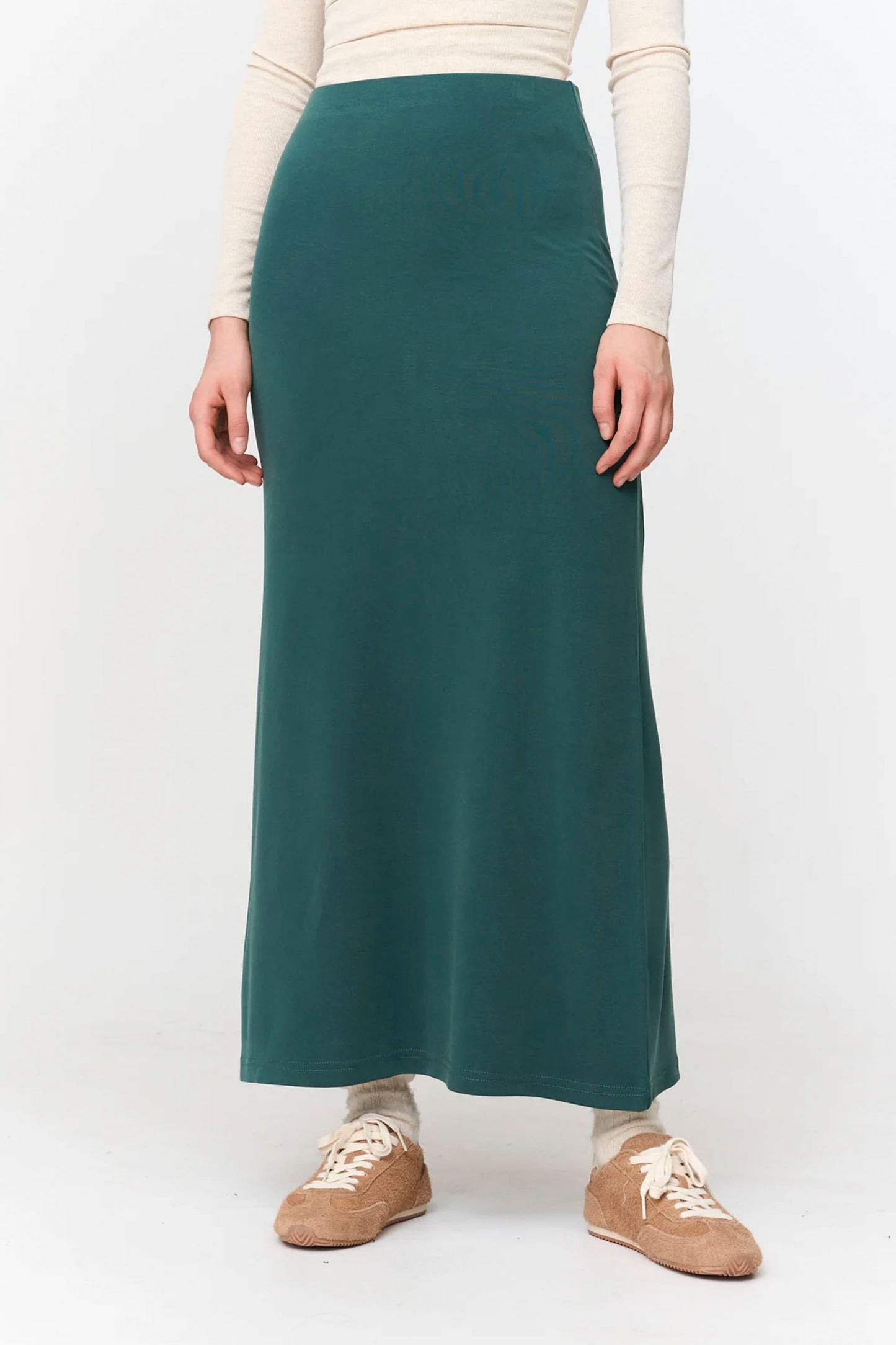 24 Colours Pukas Surf Shop soft green midi skirt relaxed drape modern silhouette