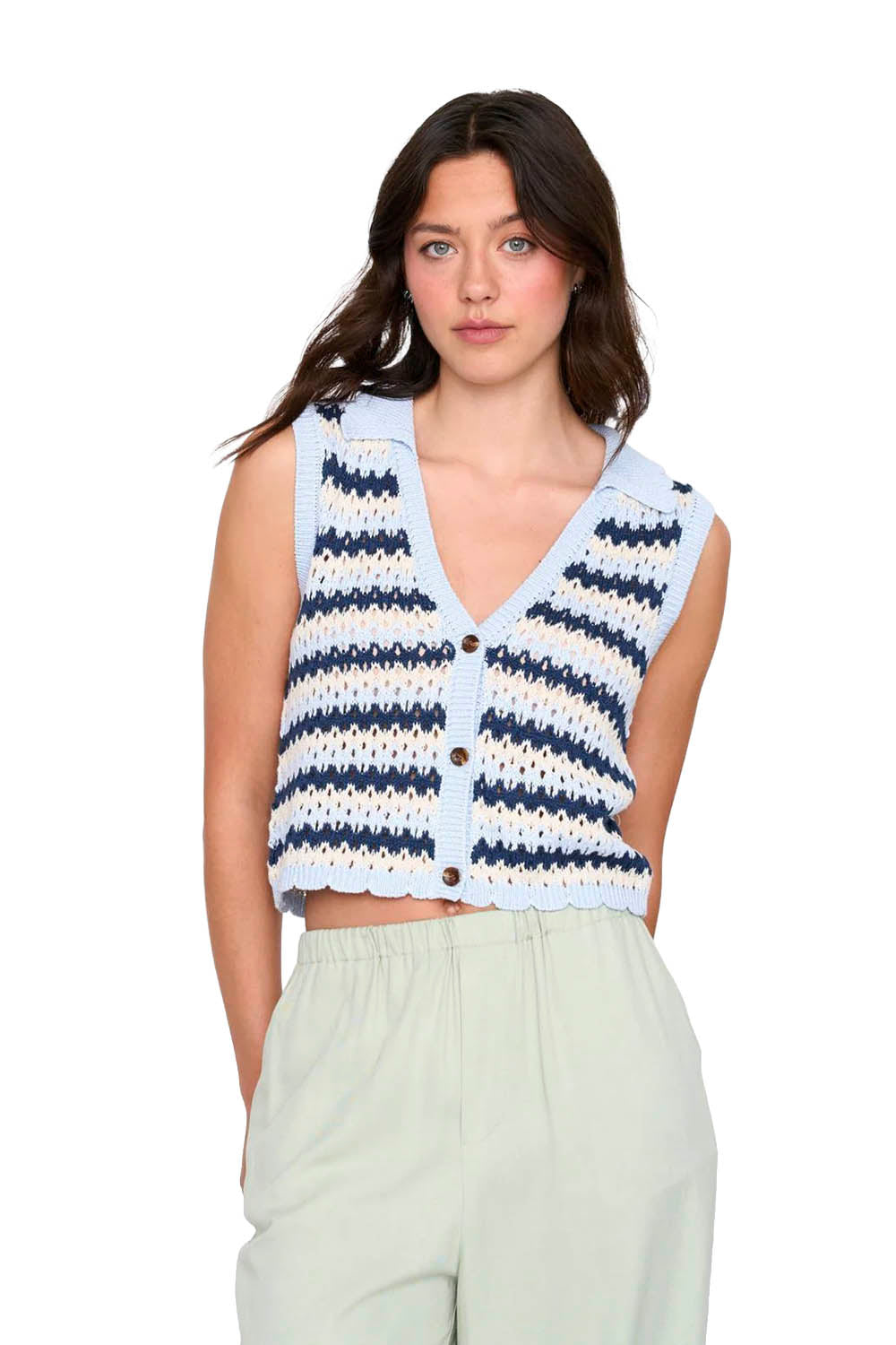 Woman wearing a striped sleeveless top with a white background