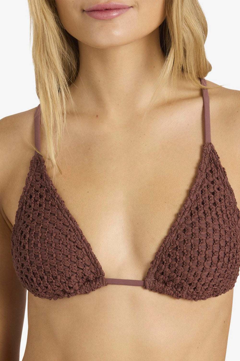 Woman wearing brown Twisted Tides bikini on a white background