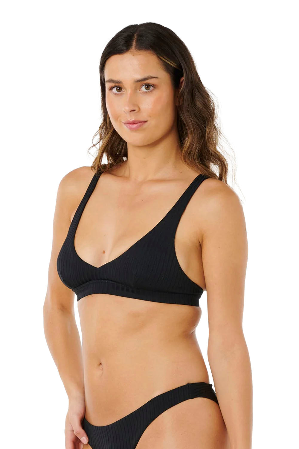 Woman wearing a black bikini on a white background