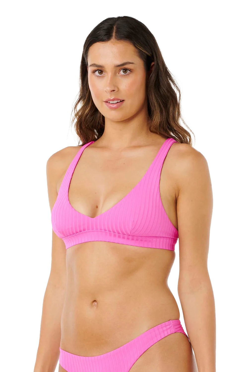 Woman wearing a pink bikini on a white background
