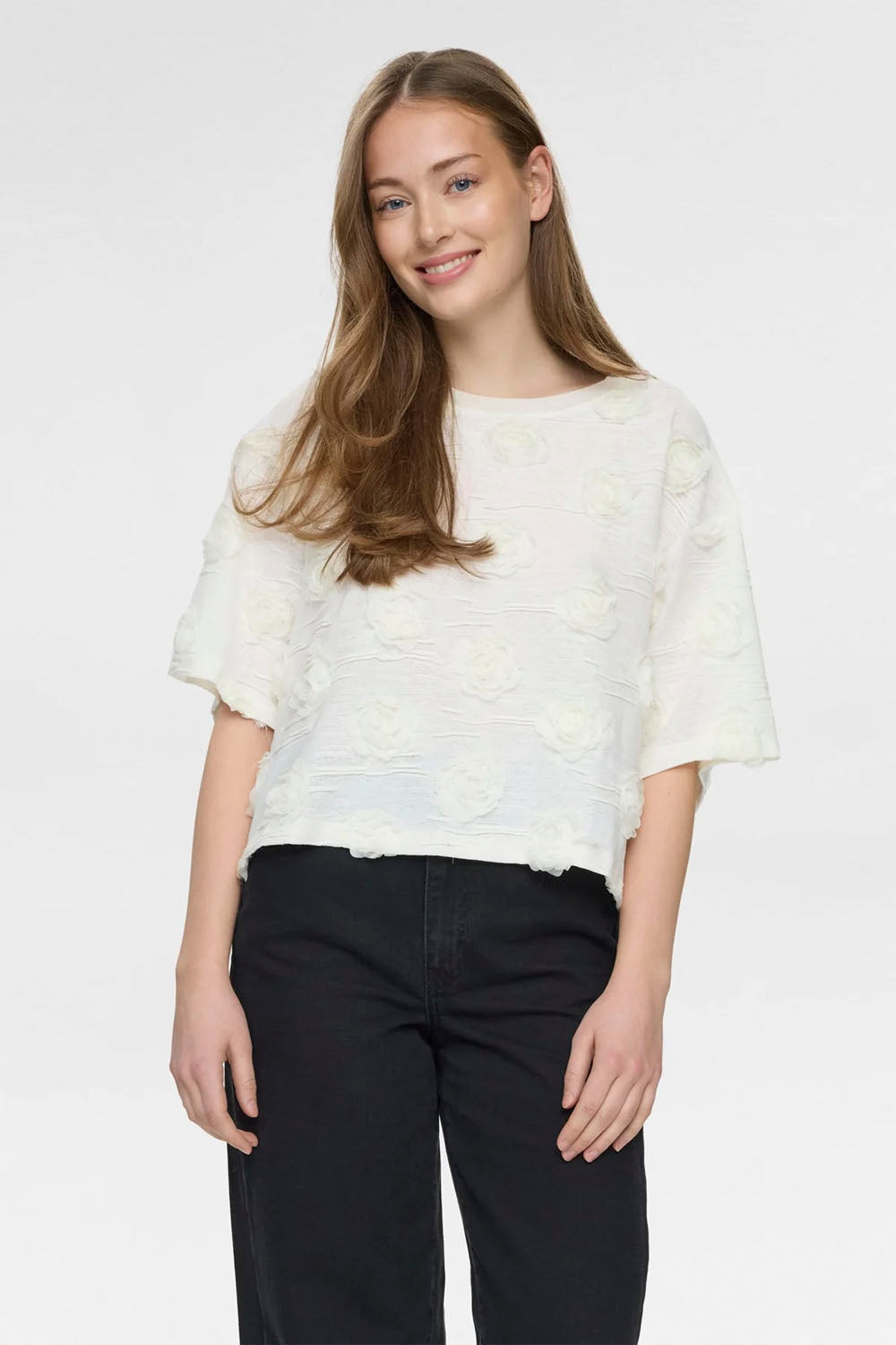 NÜMPH Nurosie T-Shirt in Cloud Dancer – women's relaxed fit white tee, available at Pukas Surf Shop